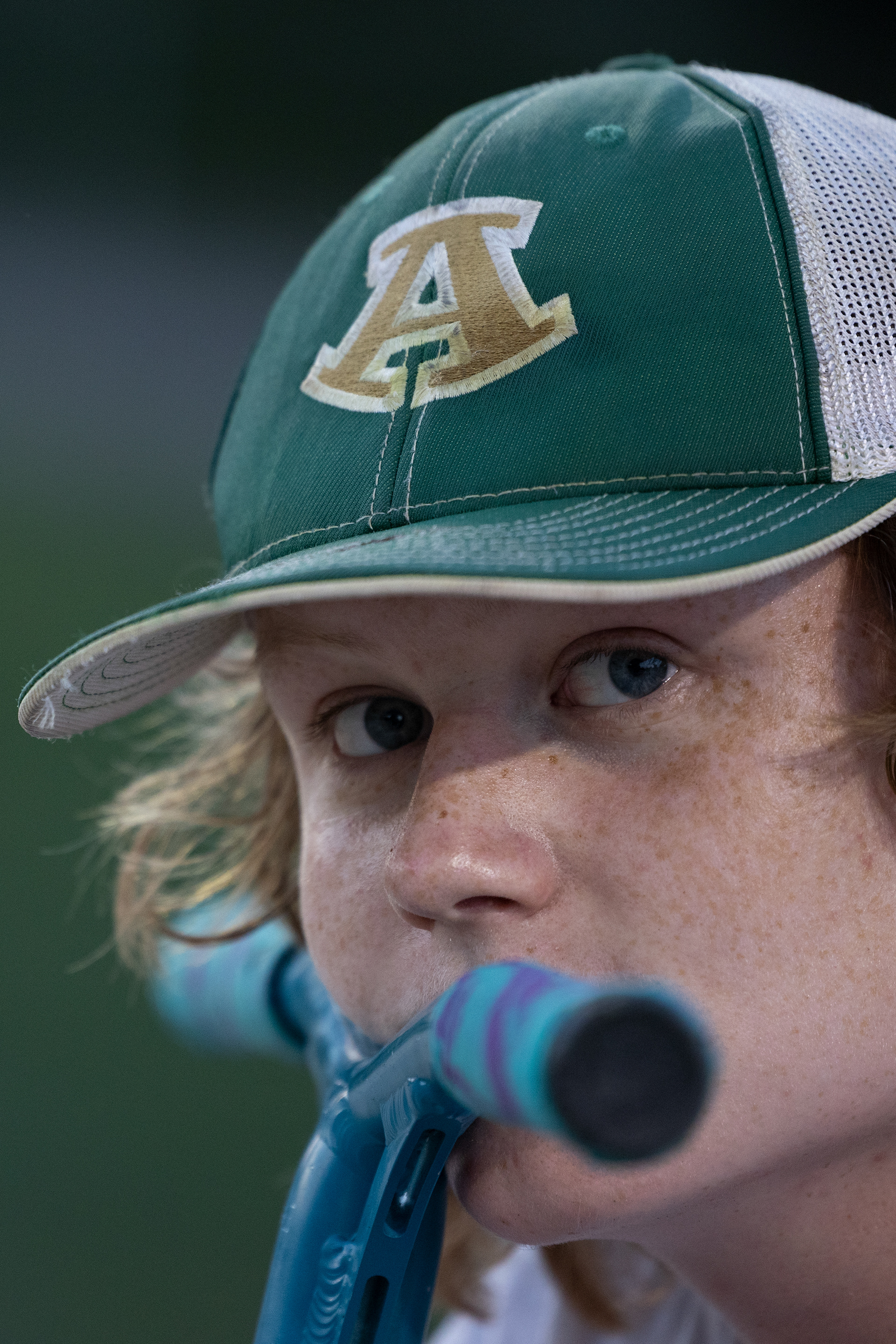 Vincent Gryszka, 14, rests his face on the handlebars of his scooter at the Athens Skatepark in Athens, Ohio, Sept. 29, 2023. Vincent is a 9th grader at Athens High School. Over the past 2 years, he has met his friend group at the skatepark. His friends range from 11-15 years old. Without the skatepark, he would have never met them.