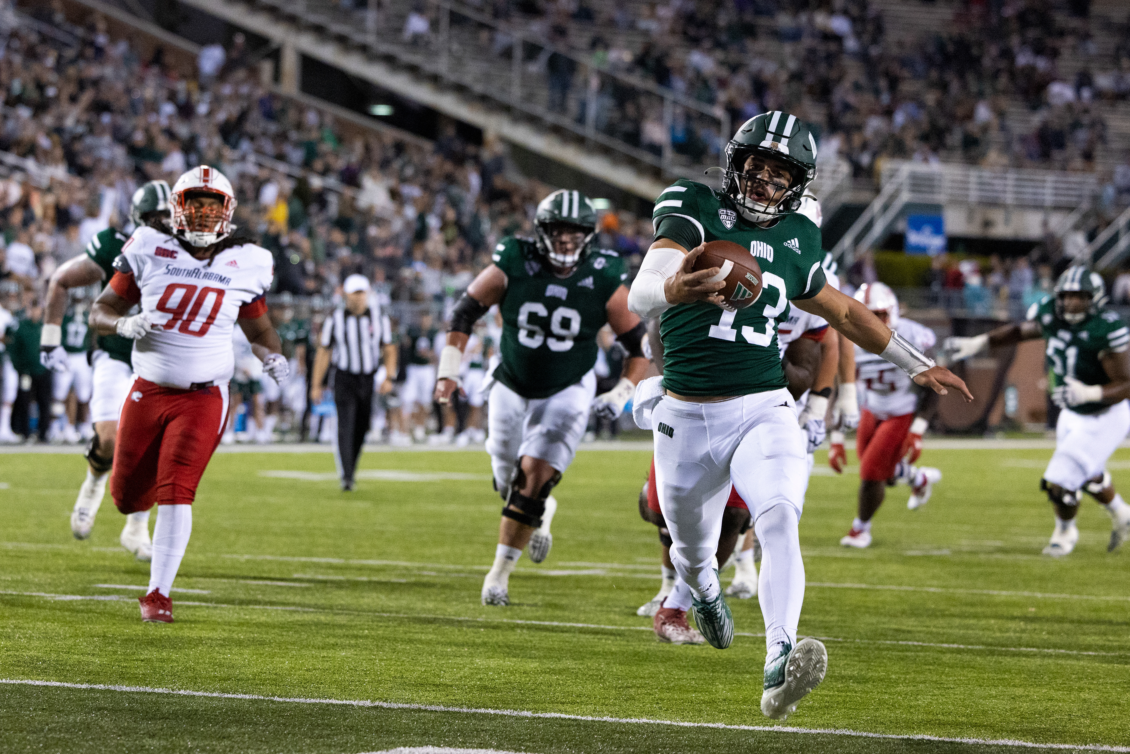Parker Navarro (13) runs into the endzone for an Ohio University touchdown against Southern Alabama at Peden Stadium in Athens, Sept. 7, 2024.
