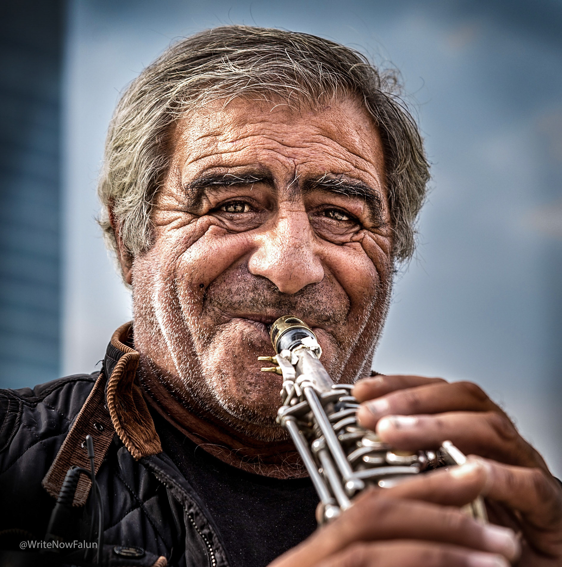 Musician outside Guggenheim, Bilbao.