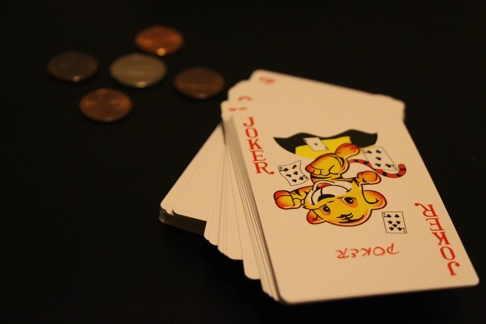 Cards: Before color correction is applied the overall image has a yellow tone to it.