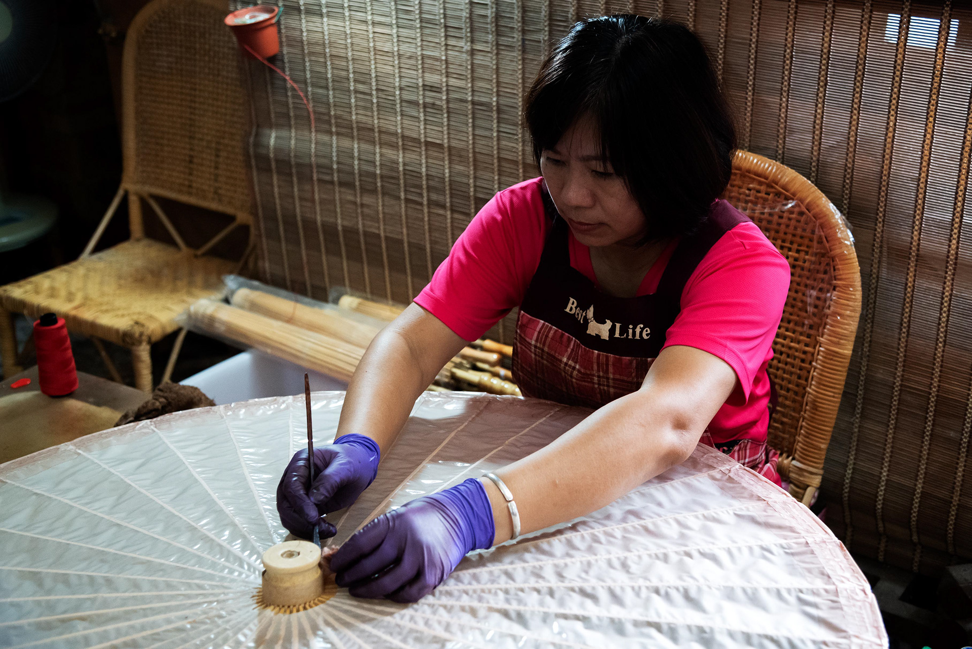 the crafting of a traditional paper umbrella