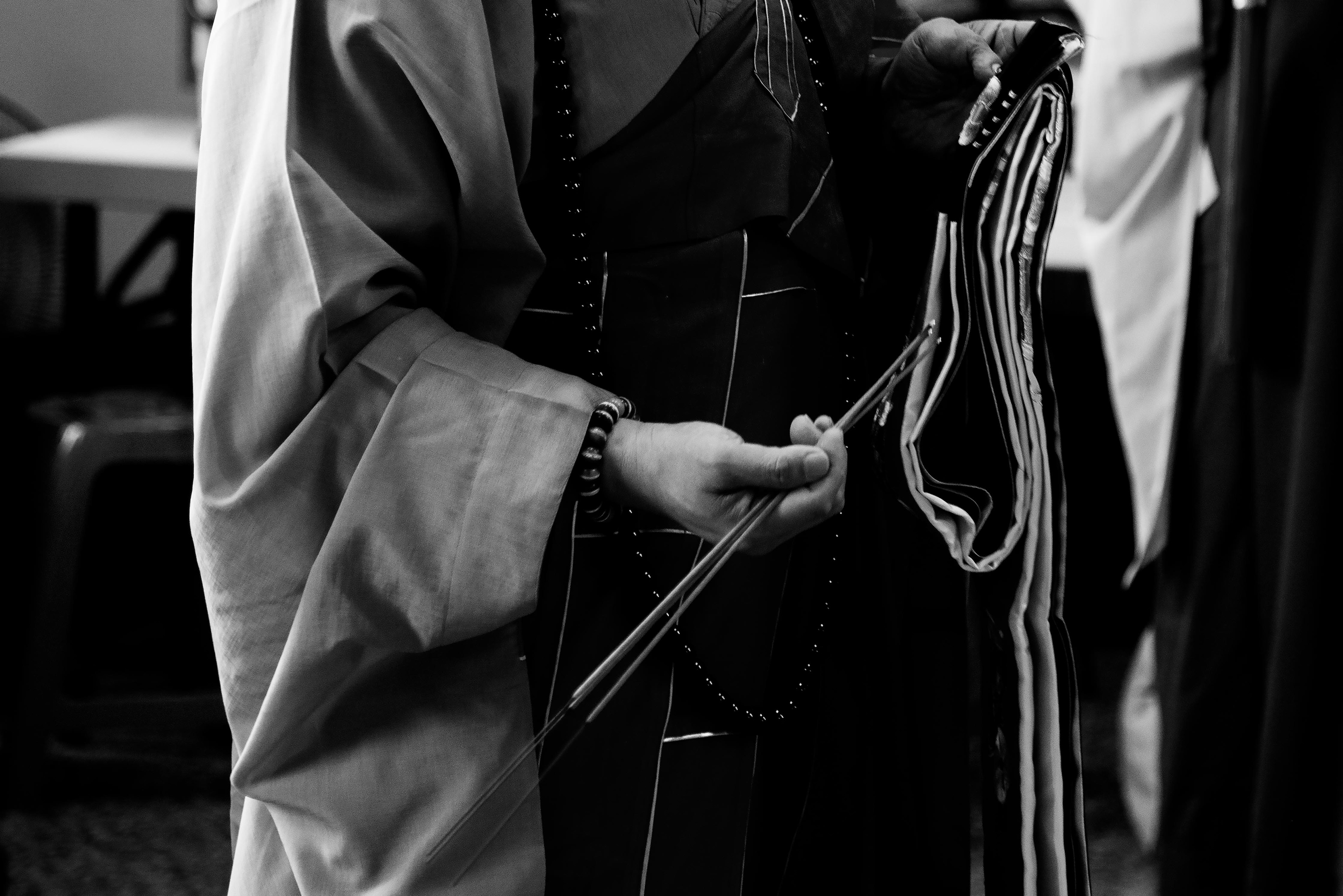 the elder monk of the temple uses incense for purification