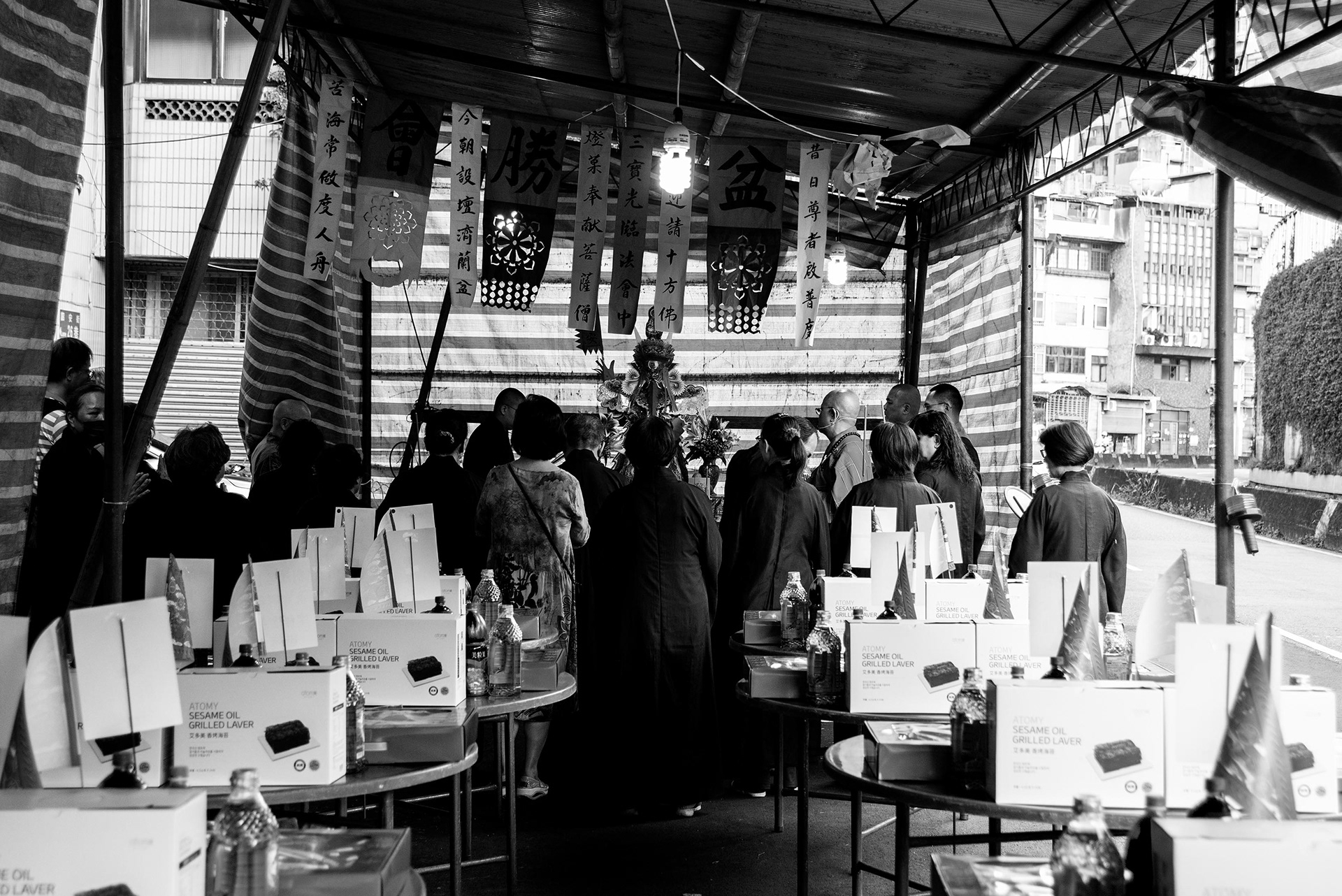 during the ceremony, the devotees go outside to present the offerings and pray