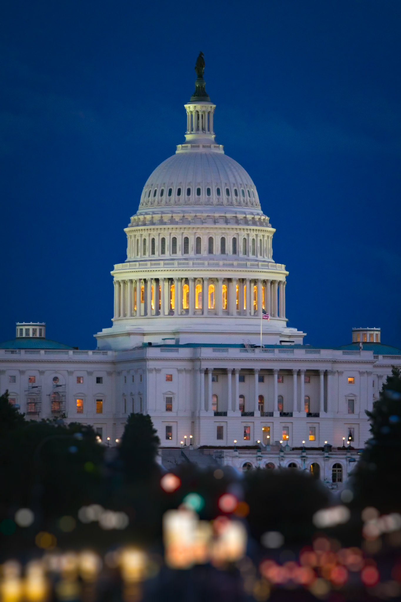 EVENING IN WASHINGTON  |  I've photographed the Capitol many times, but this image stands apart because of what happens in the foreground. As daylight faded, the traffic and city lights below dissolved into a wash of color, leaving the Capitol floating above the blur like a beacon against the evening sky.What isn't obvious is how much patience went into this photograph. I waited for the brief window between day and night when the building still held detail, the dome began to glow from within, and the city lights started to sparkle. The balance only lasted a few minutes.To me, the soft foreground gives the image a sense of distance and scale. Amid the motion of the city, the Capitol remains steady, illuminated, and unmistakably present.