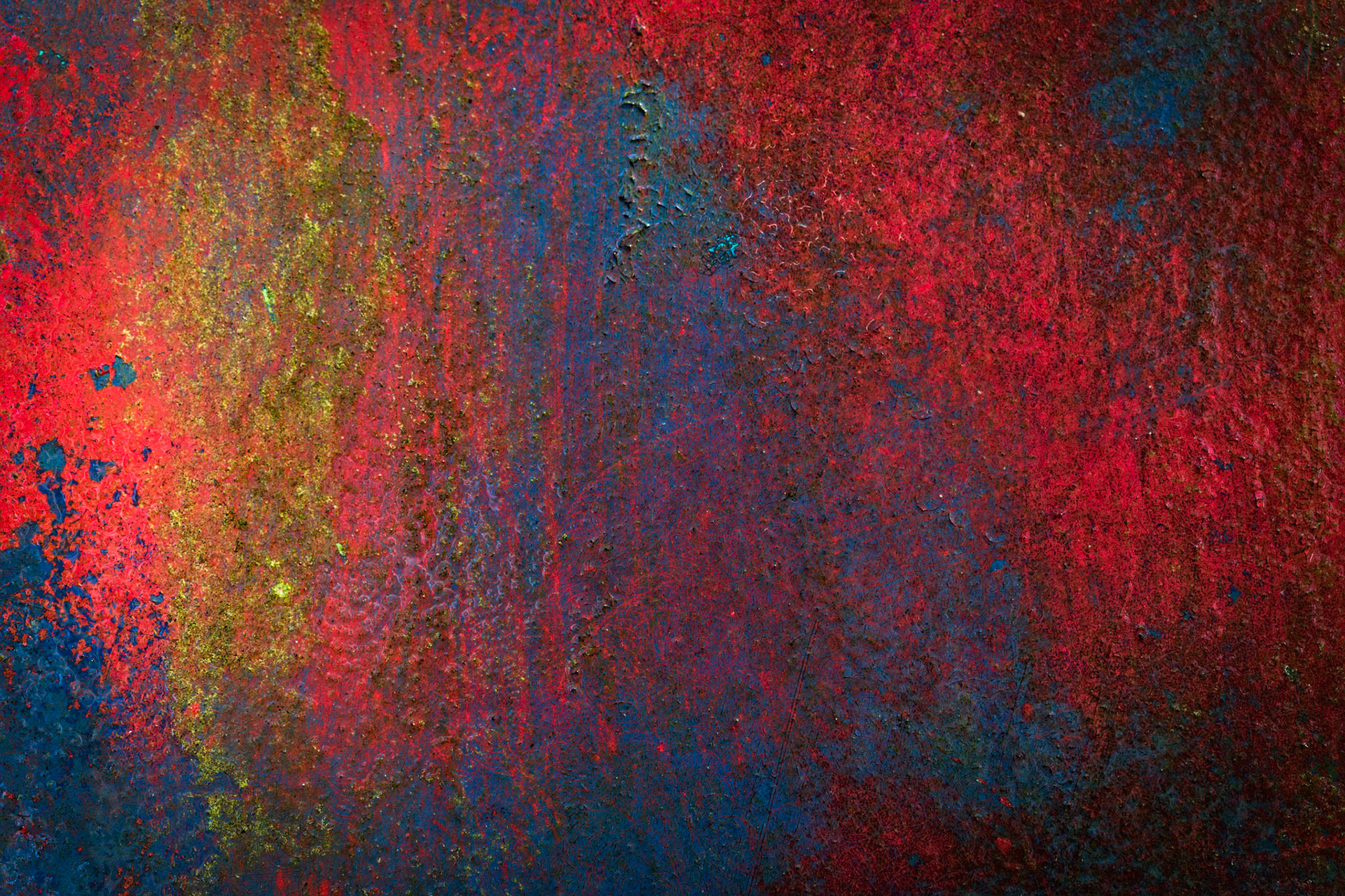 RUST AND REVERIE  |  Nothing in this image immediately reveals its origin. It could be mistaken for an expressionist painting, layers of crimson, cobalt, violet, and gold brushed across a canvas in bold, emotional strokes. Yet every color, texture, and subtle transition was created not by an artist's hand, but by years of weather, oxidation, and decay working in quiet collaboration.The longer you look, the more the image shifts from photograph to artwork. What was once painted onto steel has become something entirely new, a richly textured abstract where time, moisture, sunlight, and rust have blended pigments into a composition that feels both accidental and intentional. It is a reminder that some of nature's most compelling art is created slowly, one season at a time.