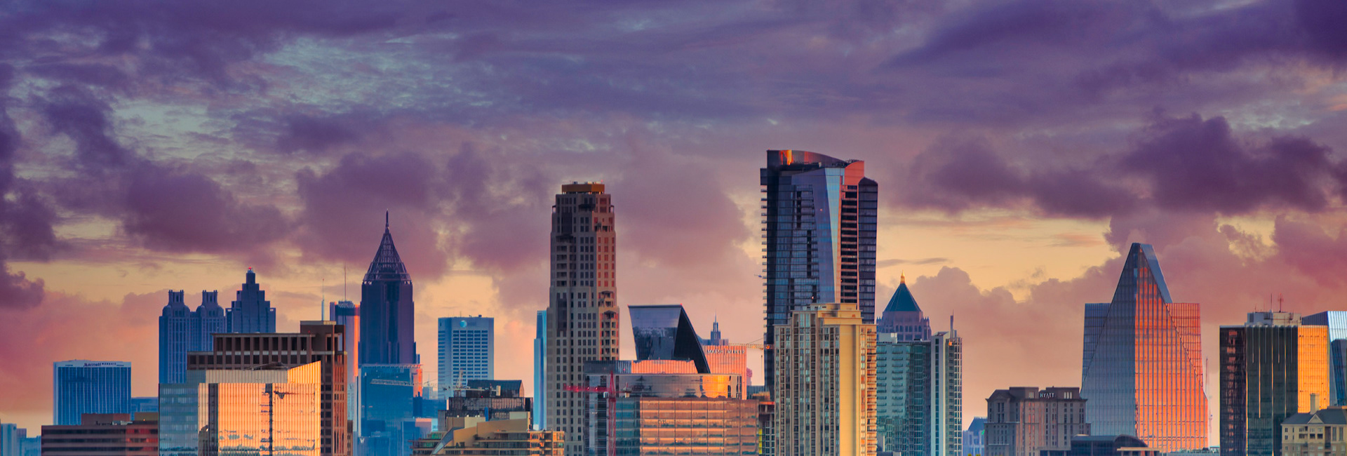 SKYLINE PASTELS  |  As the evening light reaches the skyline, Atlanta's towers glow with reflections of peach, lavender, and gold. For a few quiet moments, the city trades its usual energy for a softer, more contemplative mood.Light transforms Atlanta's skyline into a tapestry of color, revealing a gentler side of the city before the nightlife begins.