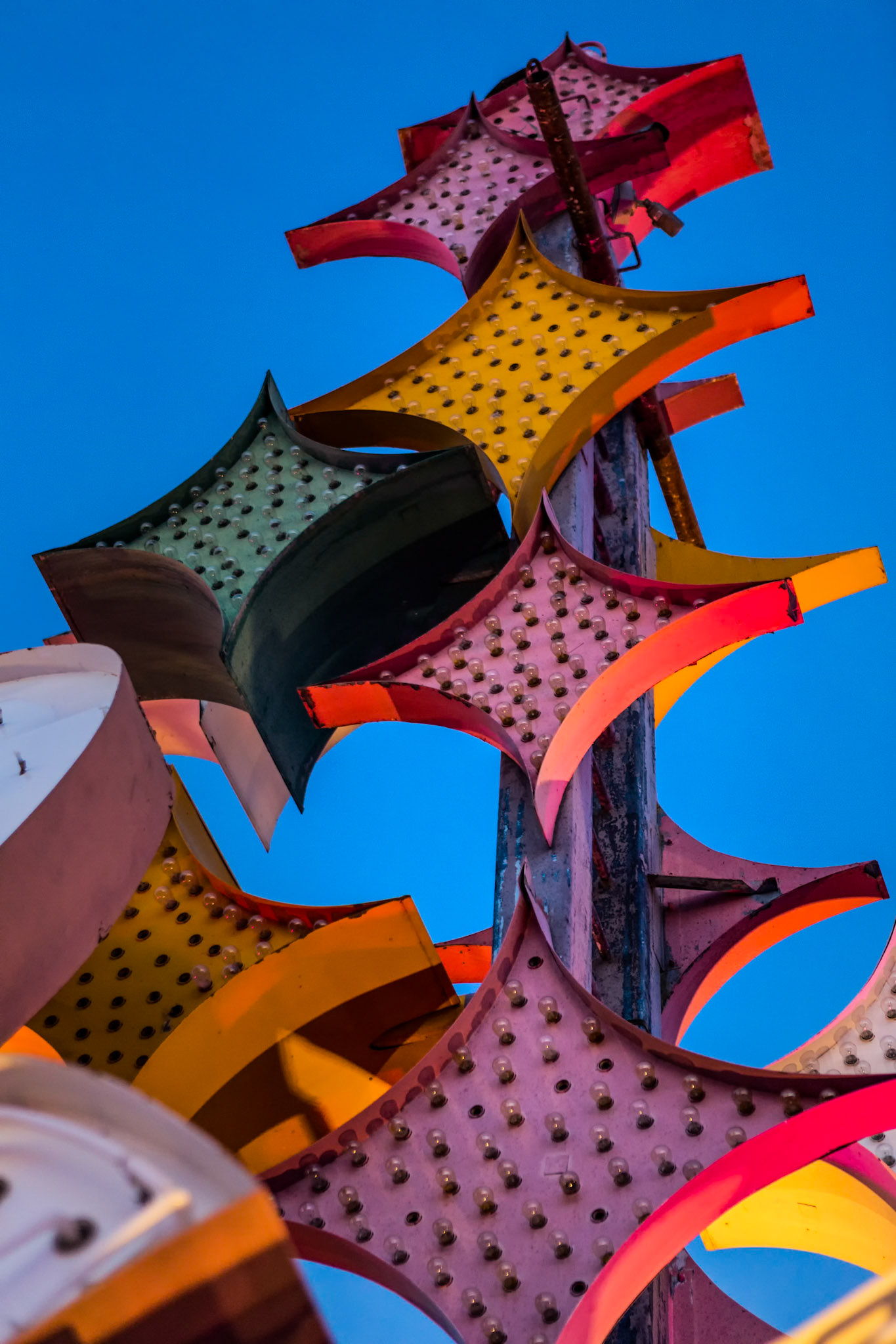 NEON TOTEM AGAINST THE BLUE