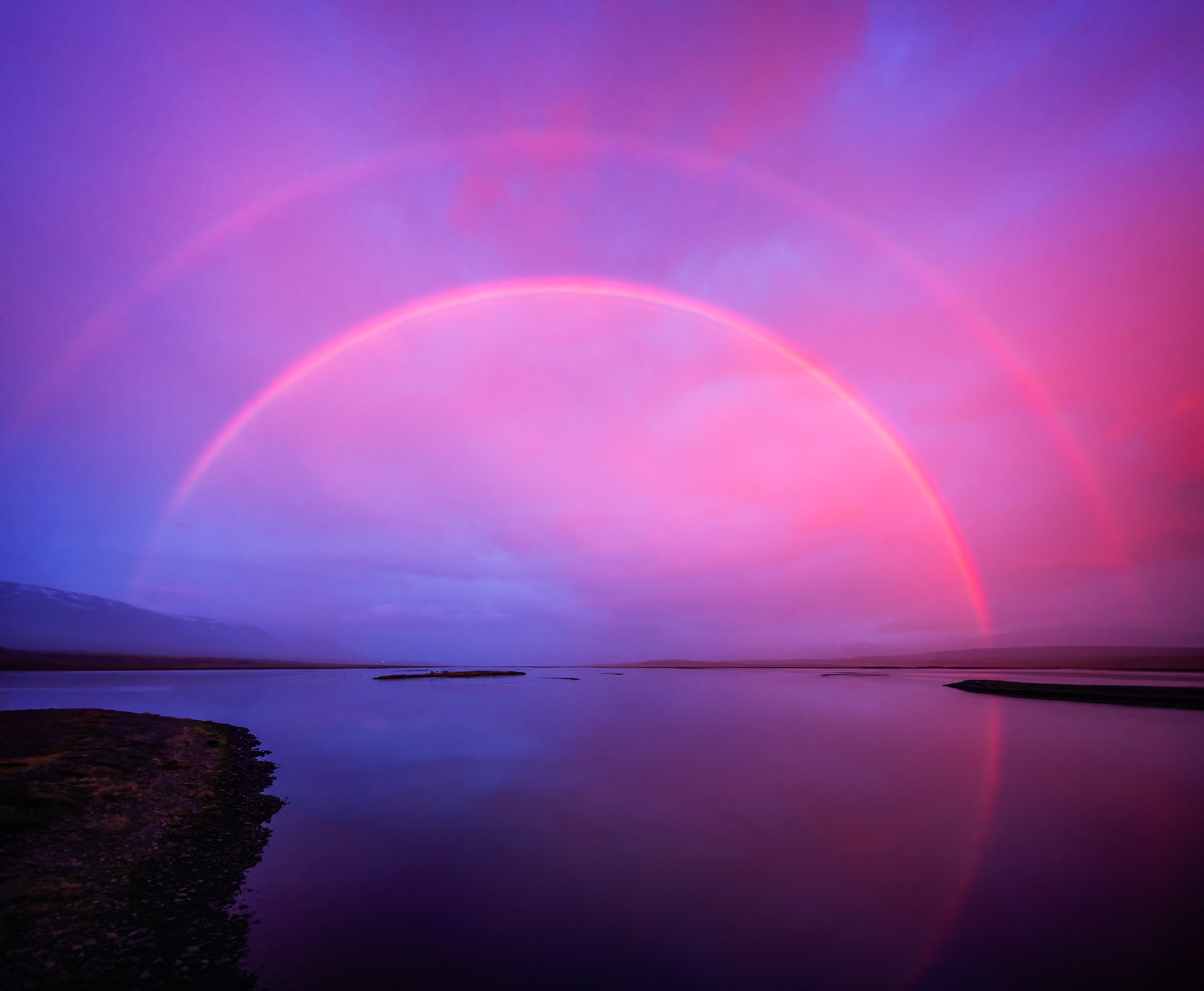 RHIANNON'S RAINBOW  |  For a few fleeting moments, the sky seemed painted in shades not found on any artist's palette. A brilliant double rainbow arched across the horizon while violet, magenta, and rose colored light transformed the landscape into something almost dreamlike.