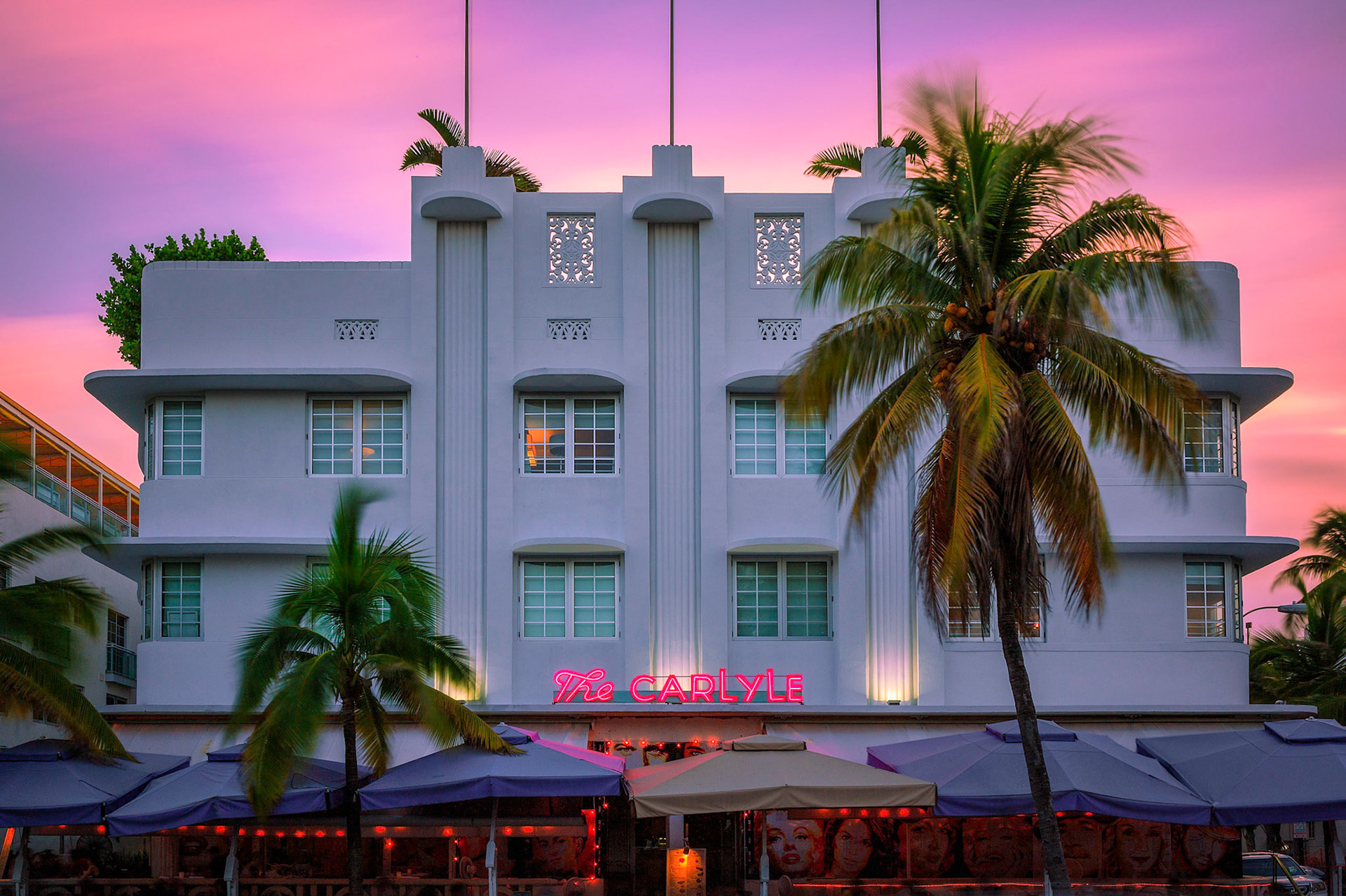 EVENING ON OCEAN DRIVE  |  Photography often rewards preparation, but sometimes it rewards timing.I had three nights in Miami Beach and planned to photograph the iconic facade of The Carlyle, forever linked in my mind to the film The Birdcage. Standing on Ocean Drive as dusk settled over South Beach, the building seemed to glow. The pastel sky, swaying palms, and neon sign created the kind of scene that has defined Miami's Art Deco district for generations.What I did not know at the time was that this would be my only opportunity.The following two nights brought rain, gray skies, and entirely different conditions. Had I waited, hoping for a better composition or stronger light, this photograph would never have existed. Instead, I chose to capture the moment in front of me, and it turned out to be the best moment of the trip.That experience reinforced an important lesson. Photographers often convince themselves there will be another chance tomorrow. Sometimes there is. Sometimes there is not. The scene in front of you may be the one gift the day offers.For me, this image is more than a photograph of a famous building. It is a reminder that timing matters, both in photography and in life. Opportunities rarely announce themselves. They simply appear, wait briefly, and then disappear.