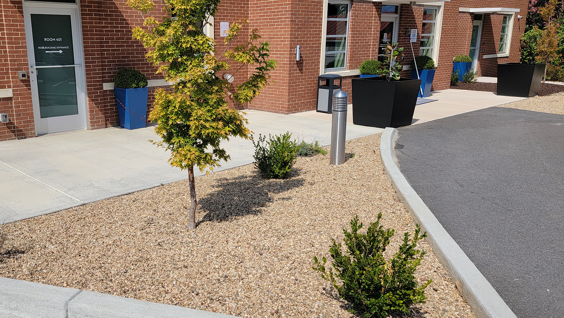 New Planting Zones & Planters Replaced Asphalt
