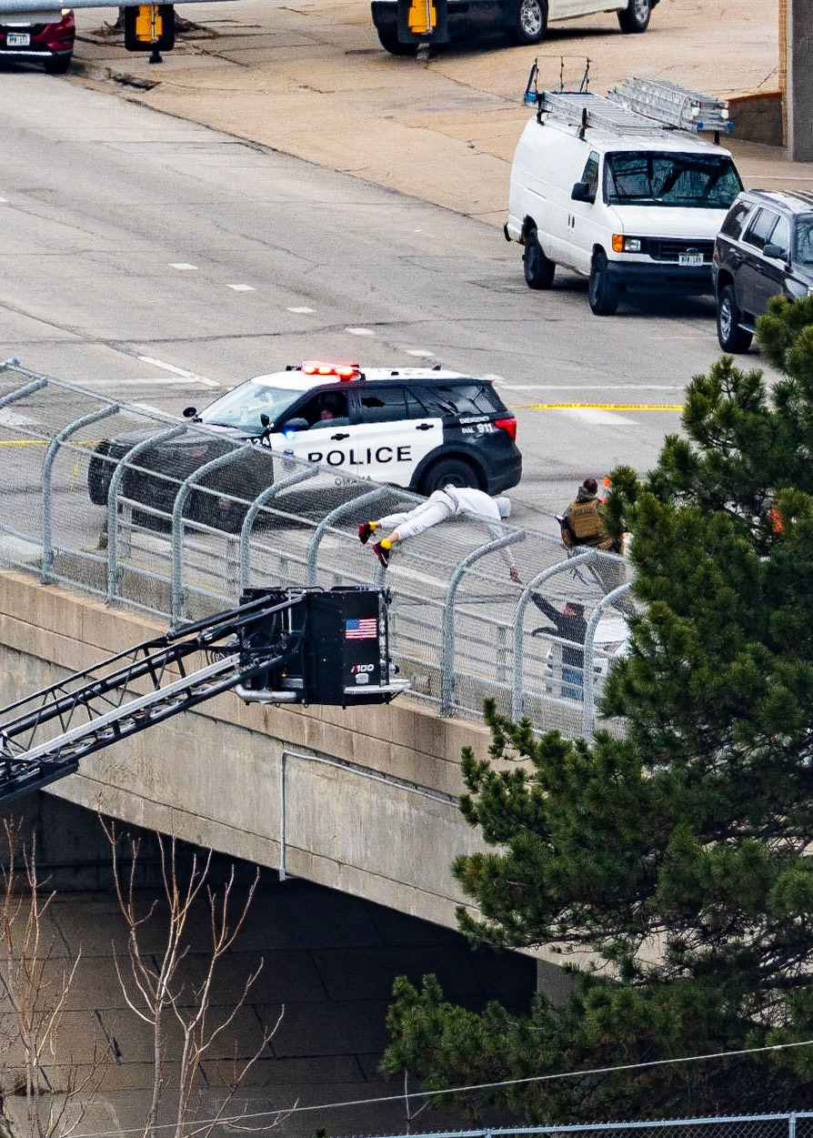 Omaha police arrested a man who climbed onto the fence of the Farnam Bridge over Interstate 480 while experiencing a mental health crisis Friday (March 31, 2023).Northbound Interstate 480 was shut down for nearly nine hours while officers assisted the man, identified as 46-year-old Frederick Patterson. (KETV 7)I spent several hours watching this drama unfold today. The situation started just before 8:00 this morning and ended just before 5:00 this evening. The Omaha Police and Fire/Rescue teams exhibited outstanding patience and professionalism in their handling of the situation.Let's hope that Mr. Patterson can find some peace, love, and understanding while obtaining professional help with his issues.