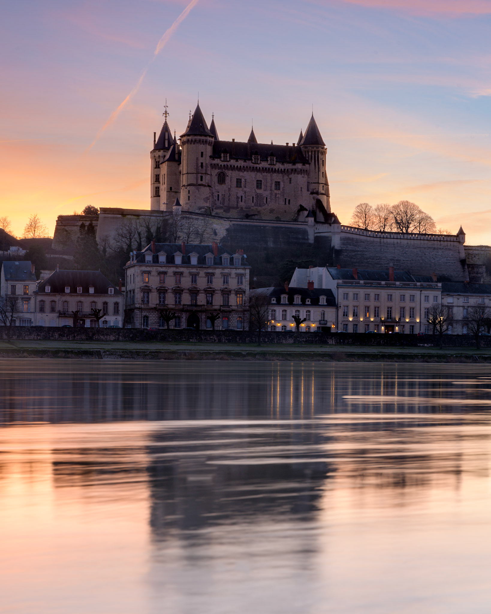 Saumur castle and the Loire river, France
