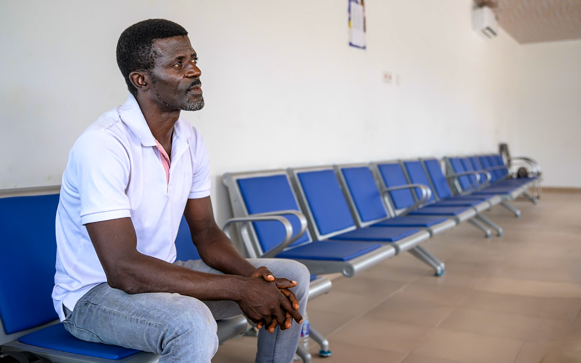 Evaristus, a refugee in Nigeria since 2019, talks to UNHCR monitoring staff about his situation and prospects. After a successful carpentry training, he started an apprenticeship in a furniture workshop, carving wood and upholstering chairs. He also works on his own on the side. He would like to see more people taking up these trainings, and "give hope to people who lost hope".PoC: Refugee