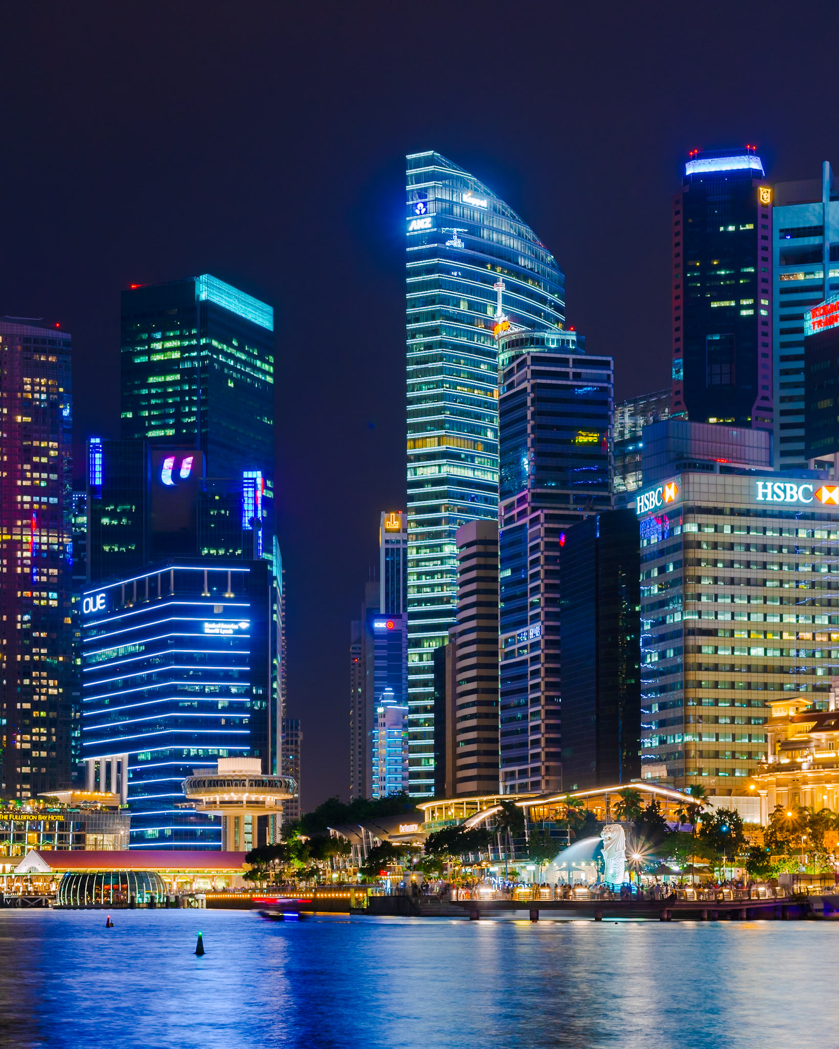 Singapore - 17 Jul 2014: a composite panorama shows the skyline of the Central Business District reflecting in the Marina Bay at night, in Singapore