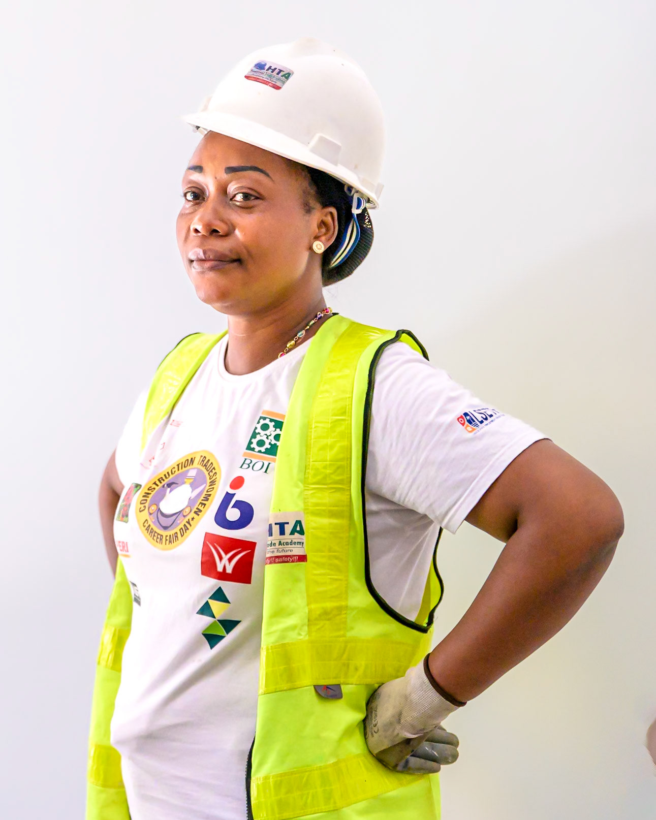 Landu, a refugee woman, poses on her workplace in Lagos, Nigeria. After a professional training supervised by UNHCR, she works full time as a painter contractor and hopes to create her own company soon thanks to UNHCR's partners help and loans. Interbau Foundation in Nigeria has trained more than 2700 women in construction crafts in 2021.PoC: Refugee
