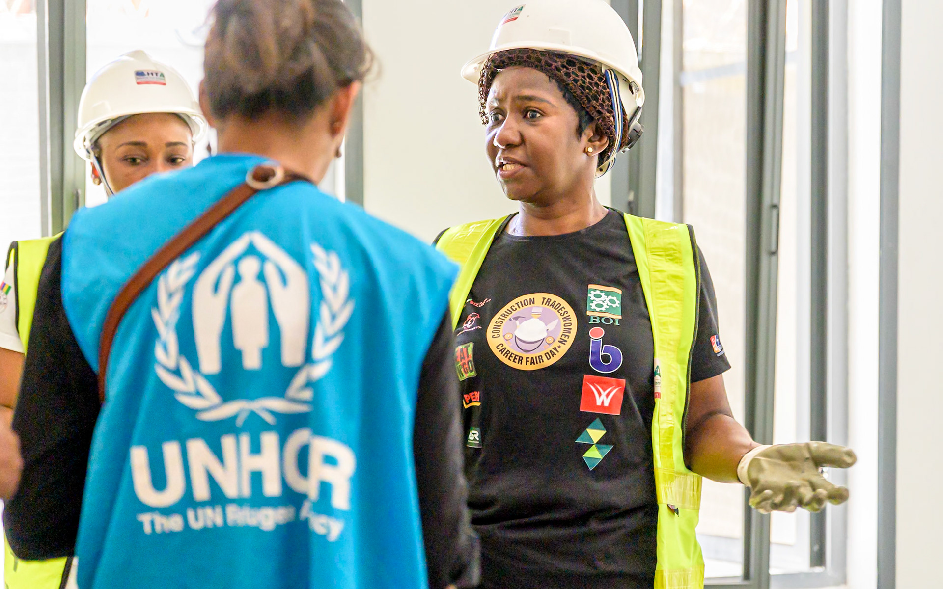 Mpela Leontin Ndonda, a refugee woman, poses on her workplace in Lagos, Nigeria. After a professional training supervised by UNHCR, she works full time as a painter contractor and hopes to create her own company soon thanks to UNHCR's partners help and loans. Interbau Foundation in Nigeria has trained more than 2700 women in construction crafts in 2021.PoC: Refugee