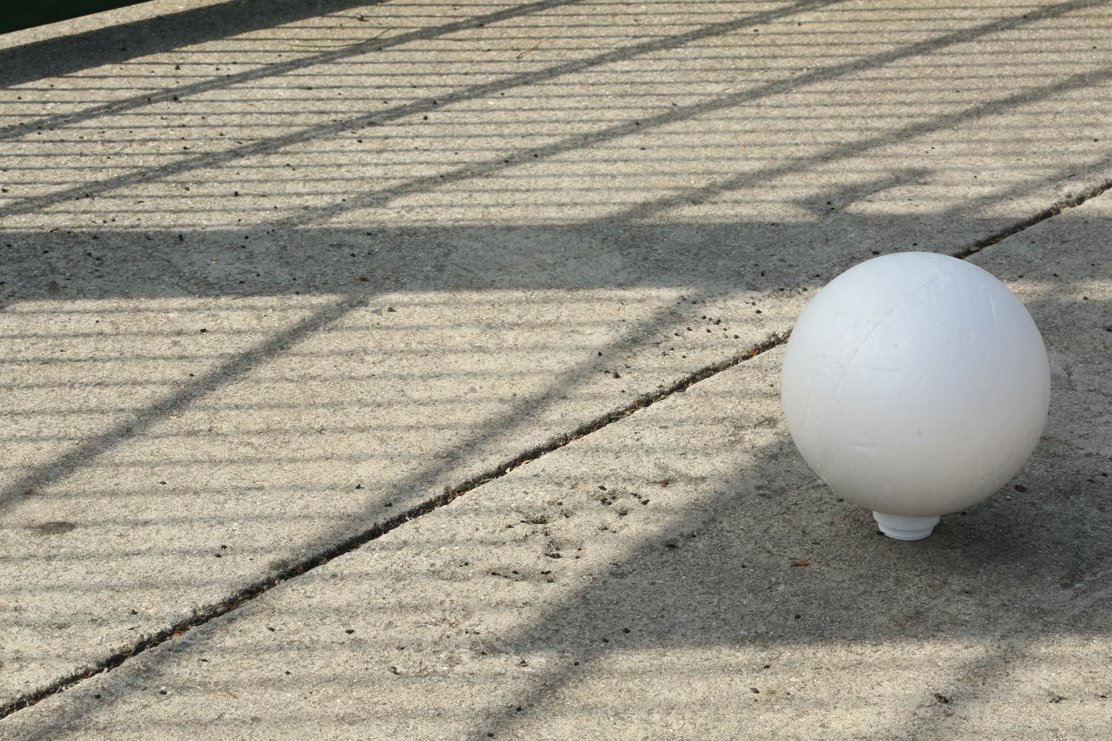 White Ball in Shadow