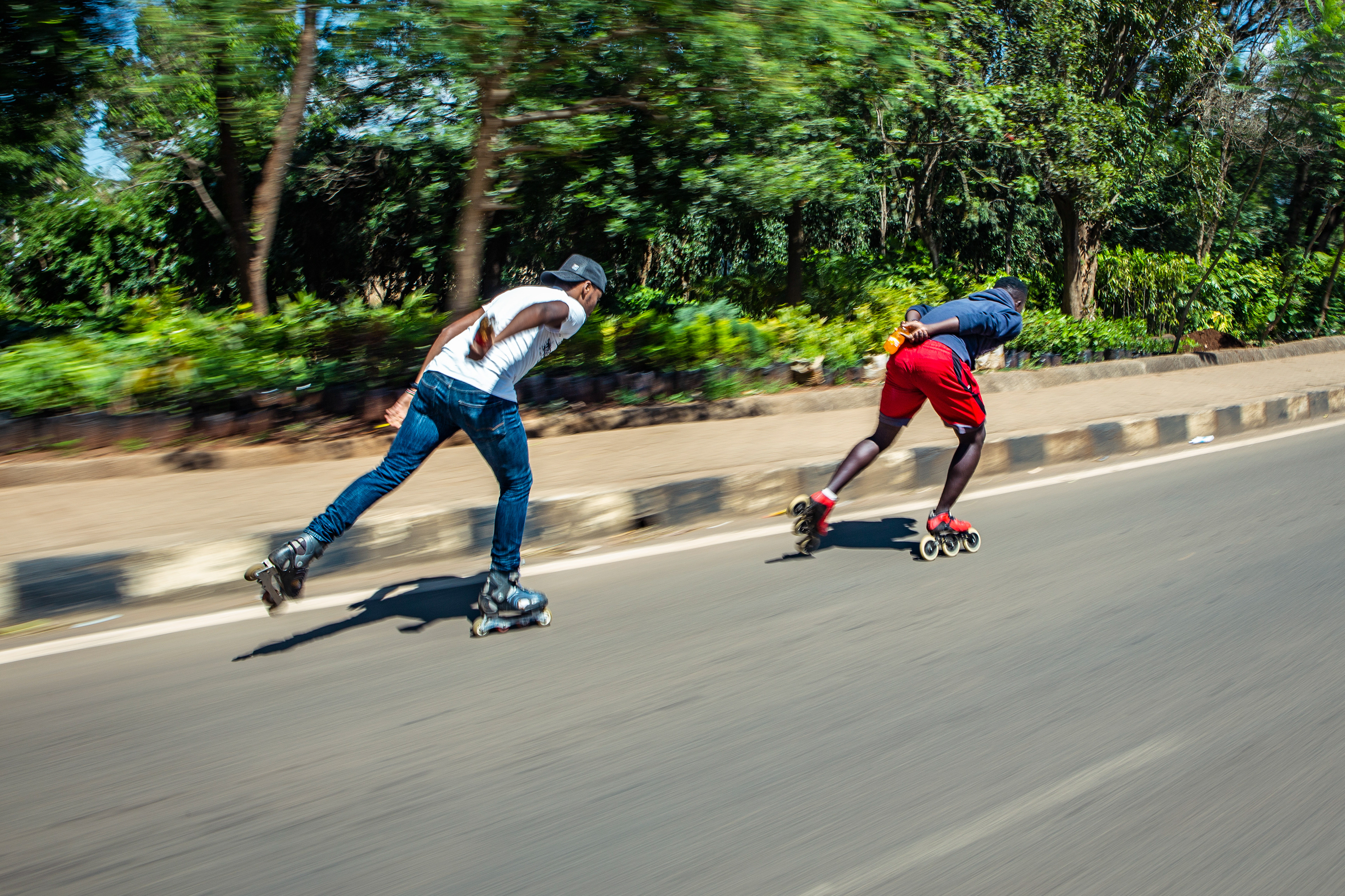 Lenny Alvin and Allan Ayigah gain speed before turning on to the highway.