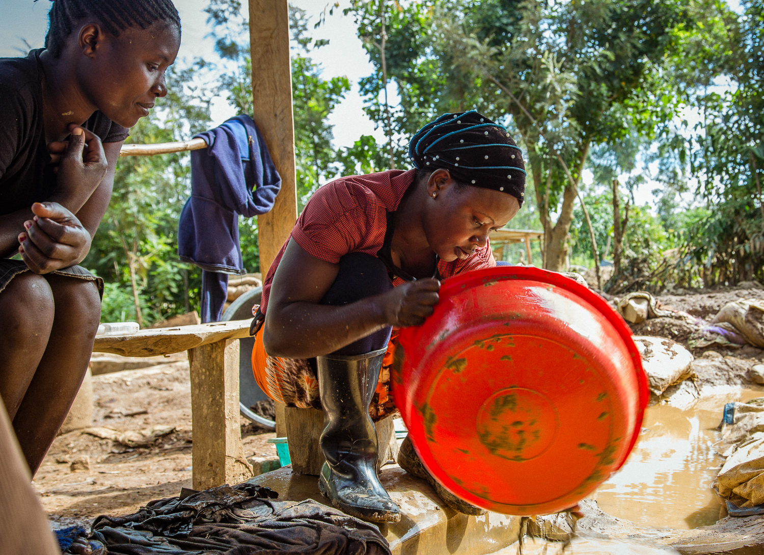 The processed ore, at this point turned into dust, is mixed with water laced with mercury to extract the gold. All of this is done with no protective gear for the workers.