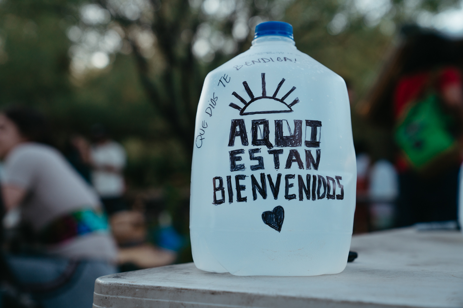 Decorating gallon jugs the night before the water drop.