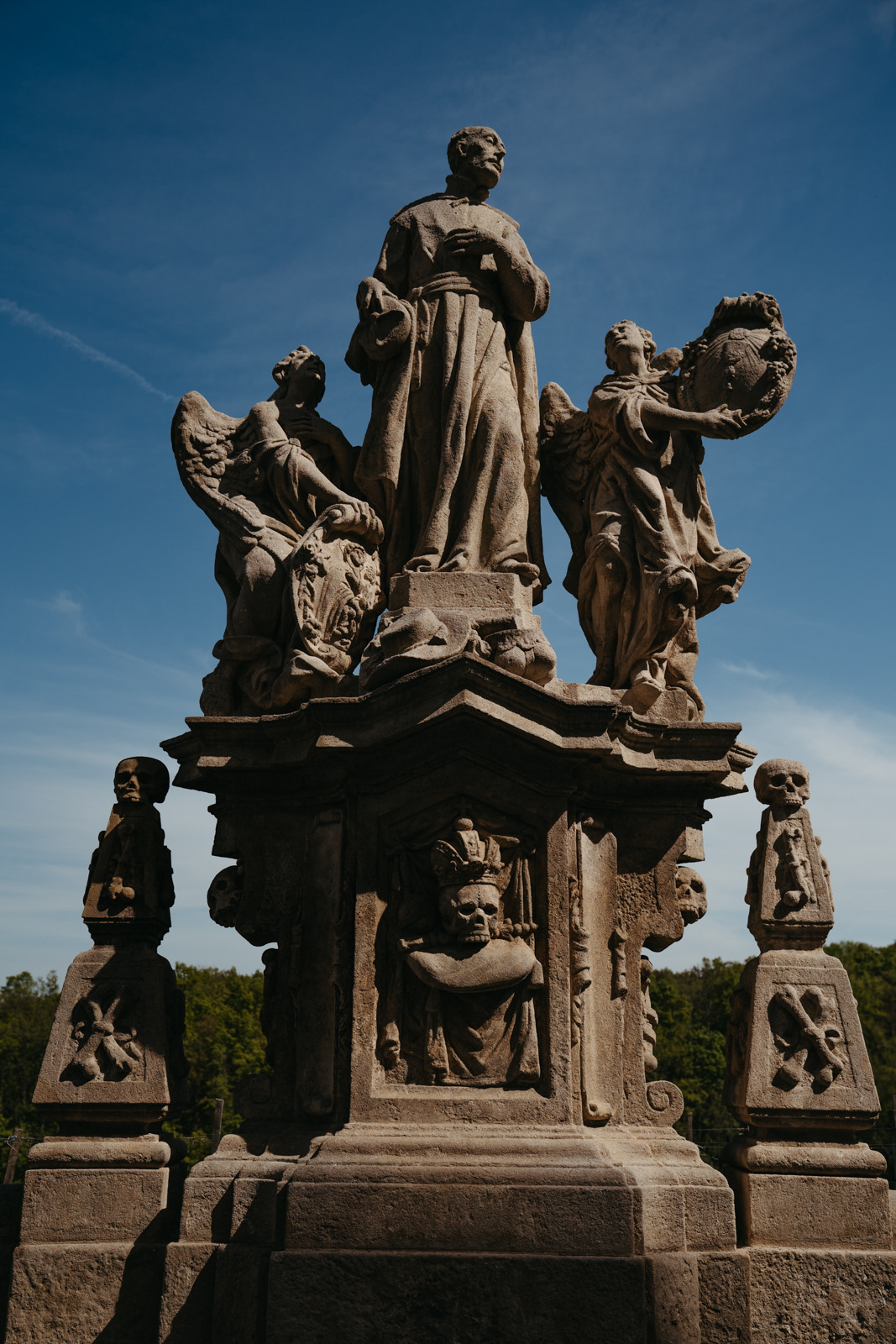 Gothic statues line the walkway up to St Barbara's Church