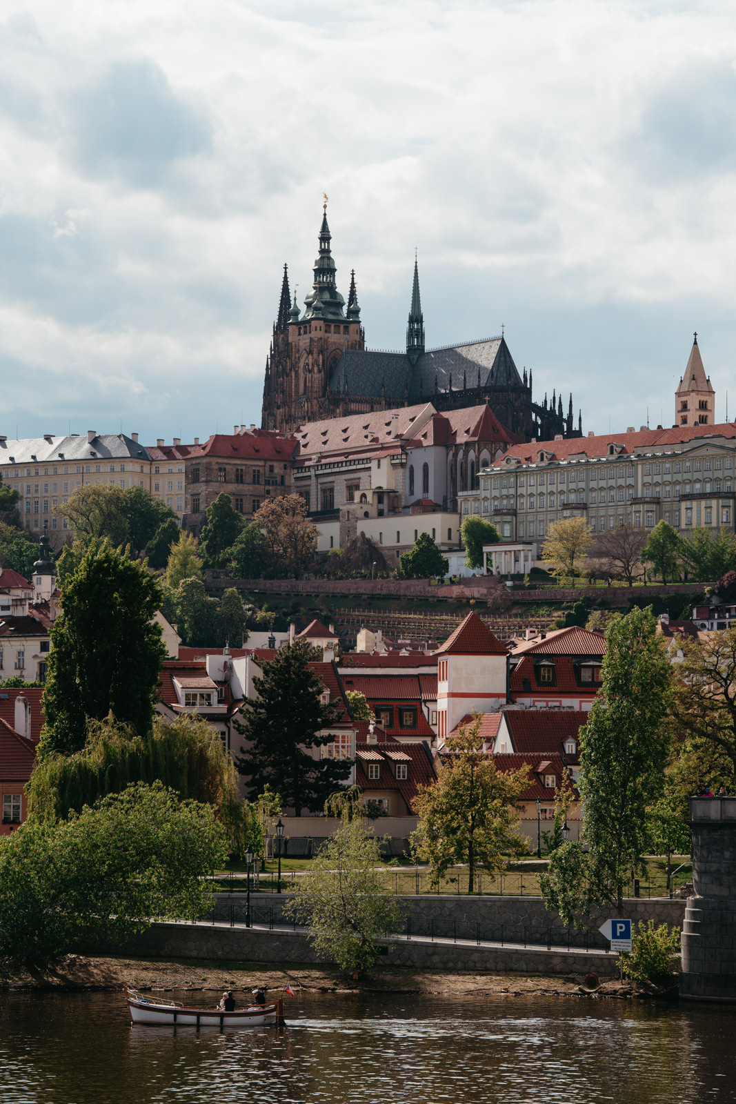 St Vitus Cathedral and Prague Castle above a hill overlooking the Vltava river