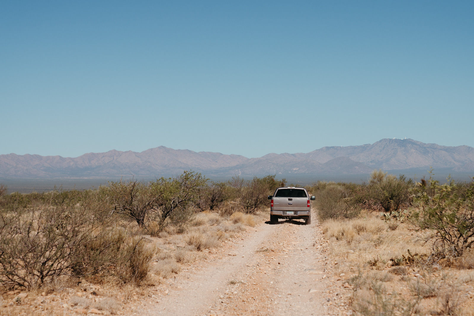 No More Deaths volunteers left gallons of water and canned foods on the weekend of the summer solstice to create a 'water line' through Arizona state trust land.