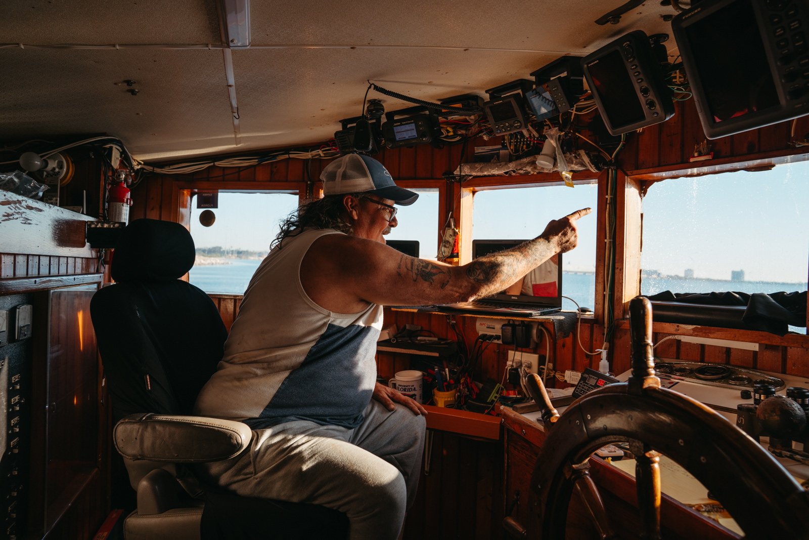 Captain Jimmy pointing out to sea