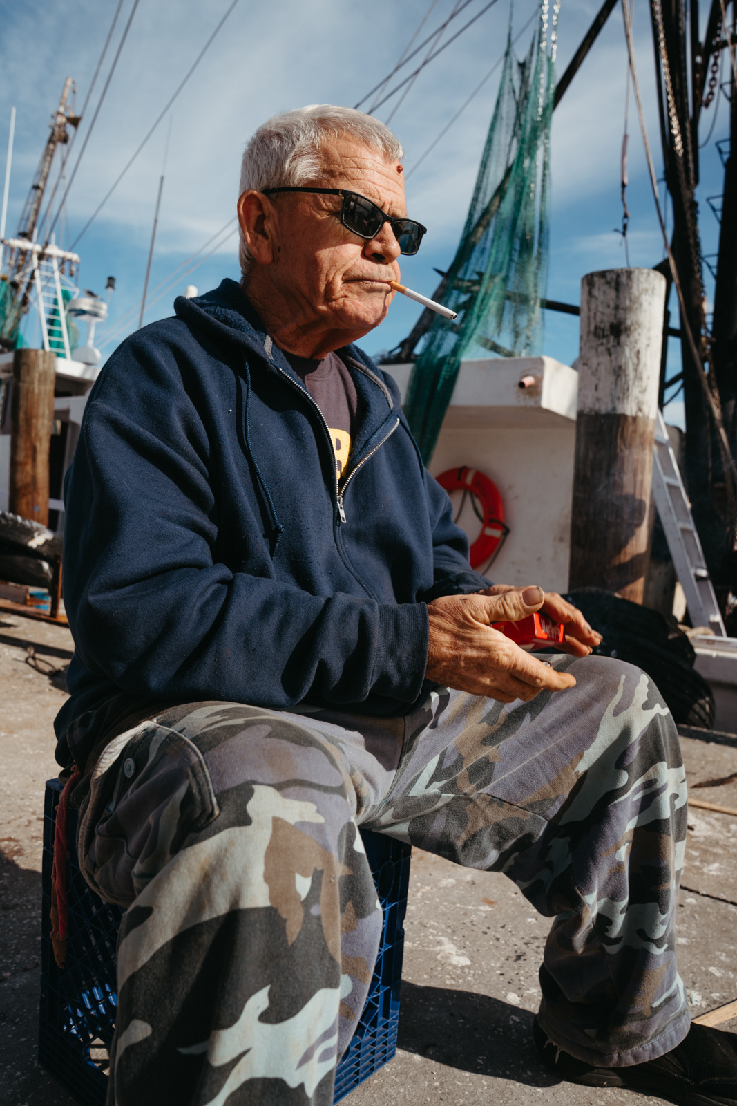 Captain Jerry smoking at Versaggi Shrimp Co.