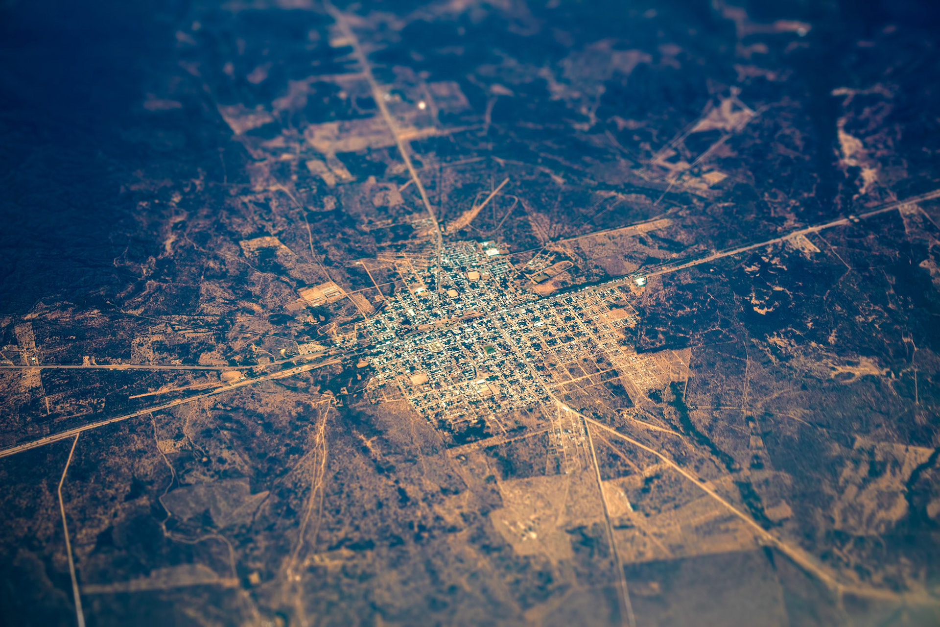 Aerial view of the small town with regular planning.