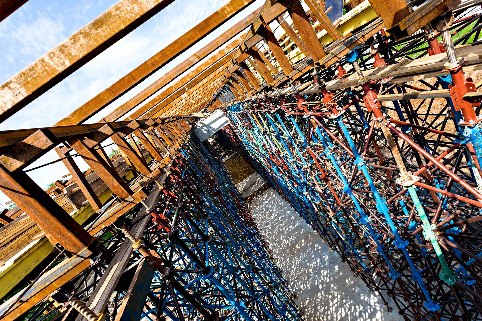 Rusty scaffolds of an elevated road construction