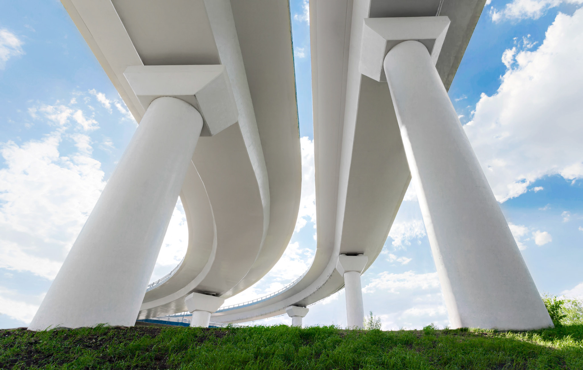 Two trestles on the green grass and sky background