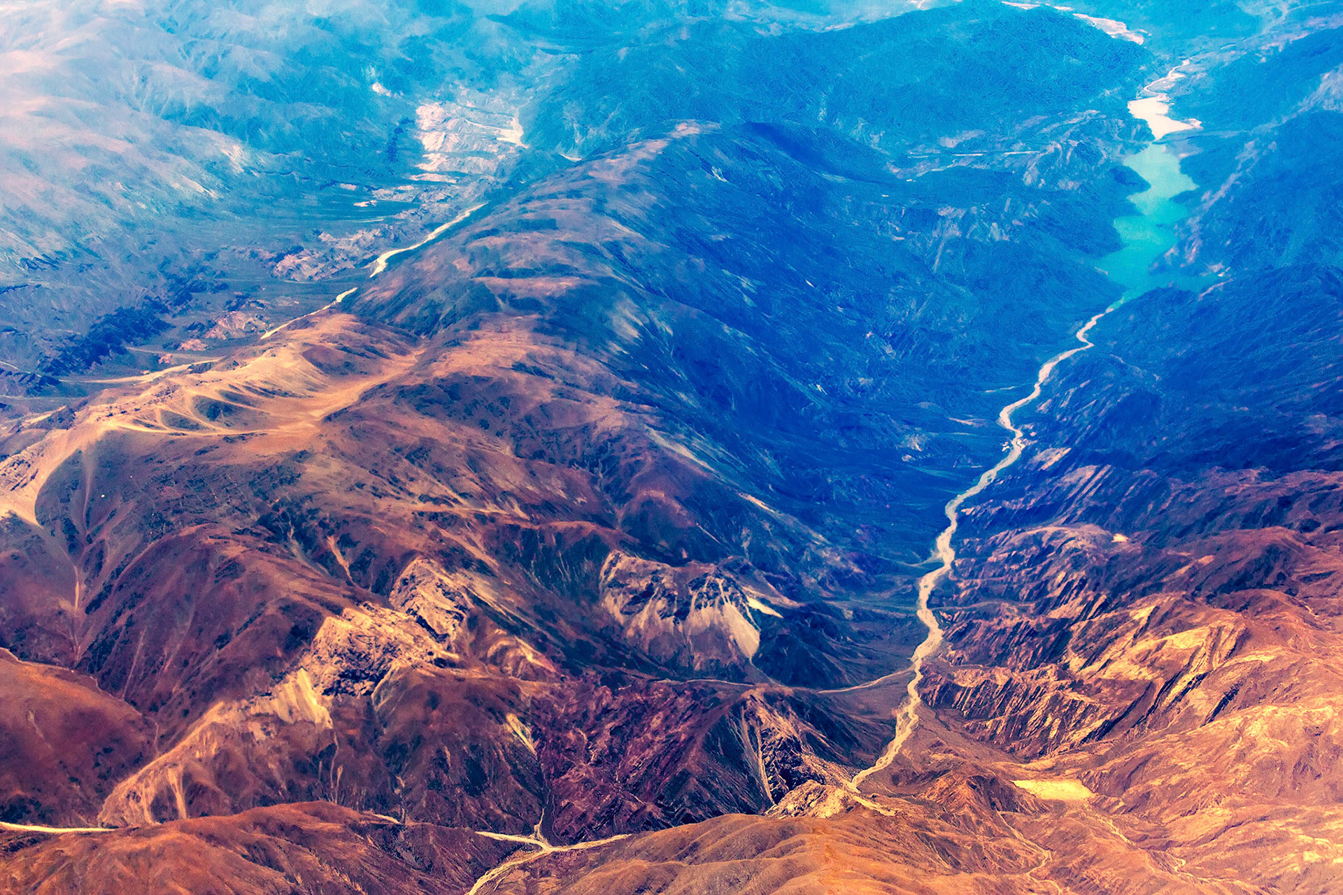 Water reservoir on the lowland of the mountain, view from above