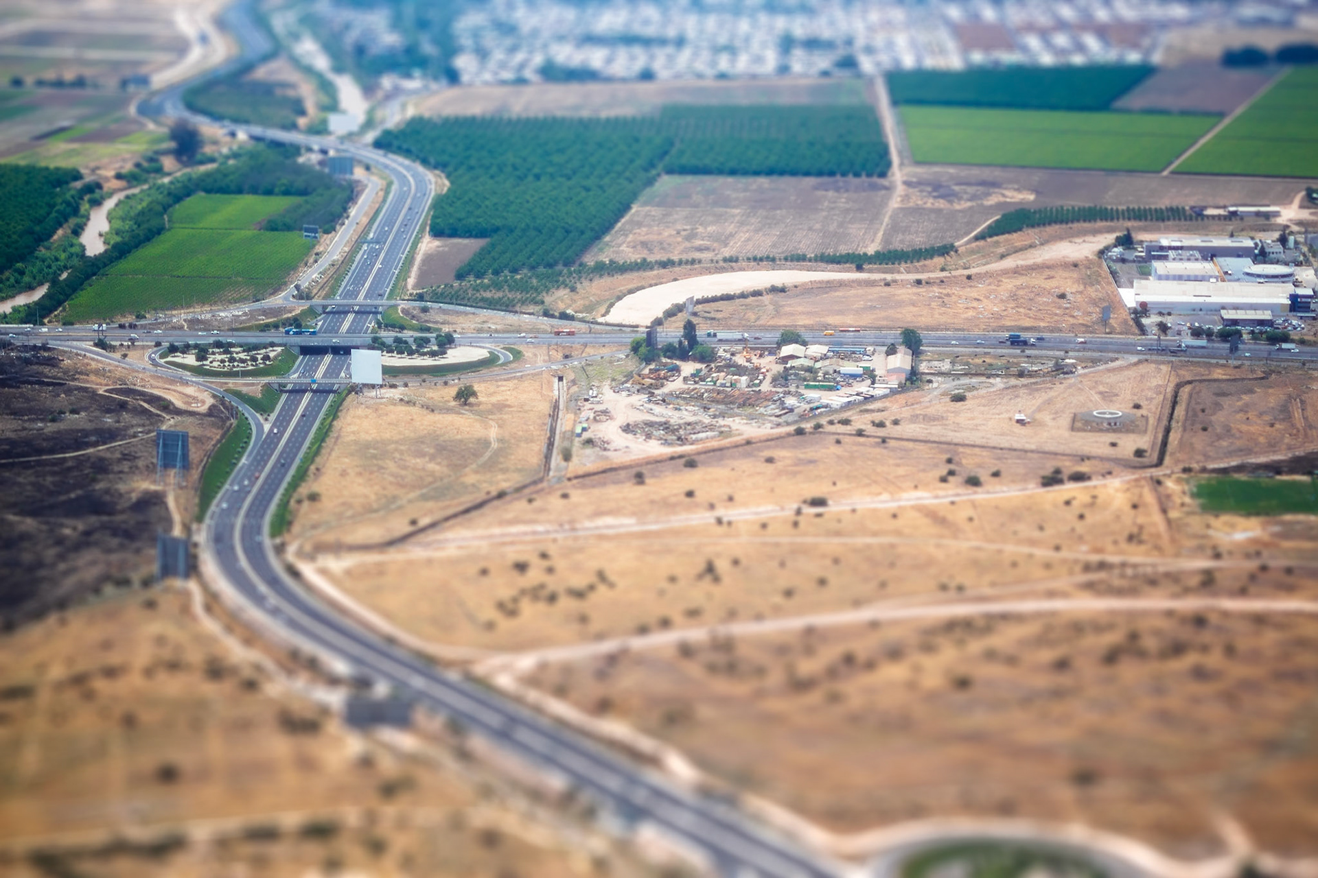 Airplane view of the suburbs of Santiago, Chile with tilt-shift effect