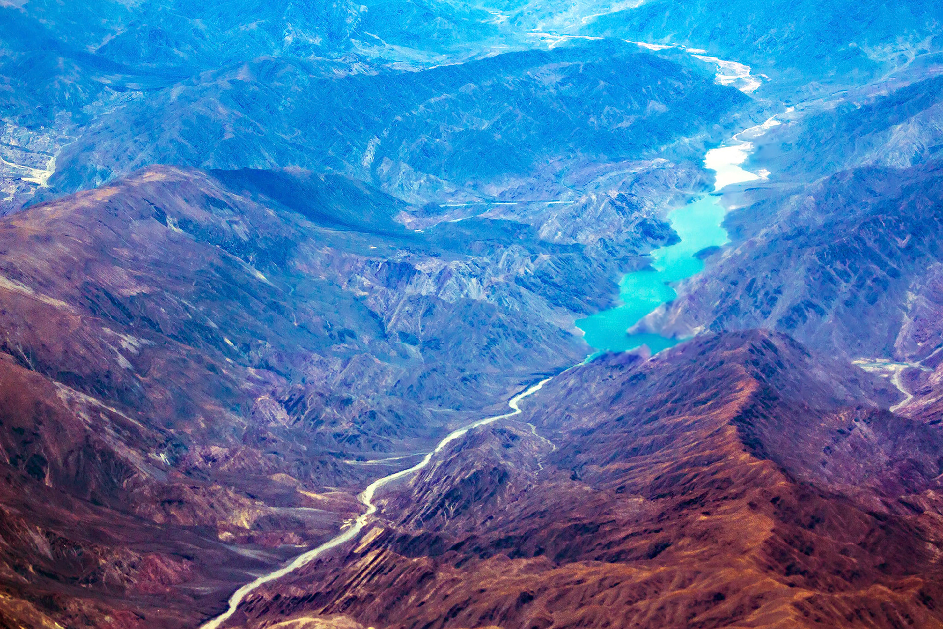 Water reservoir on the lowland of the mountain, view from above