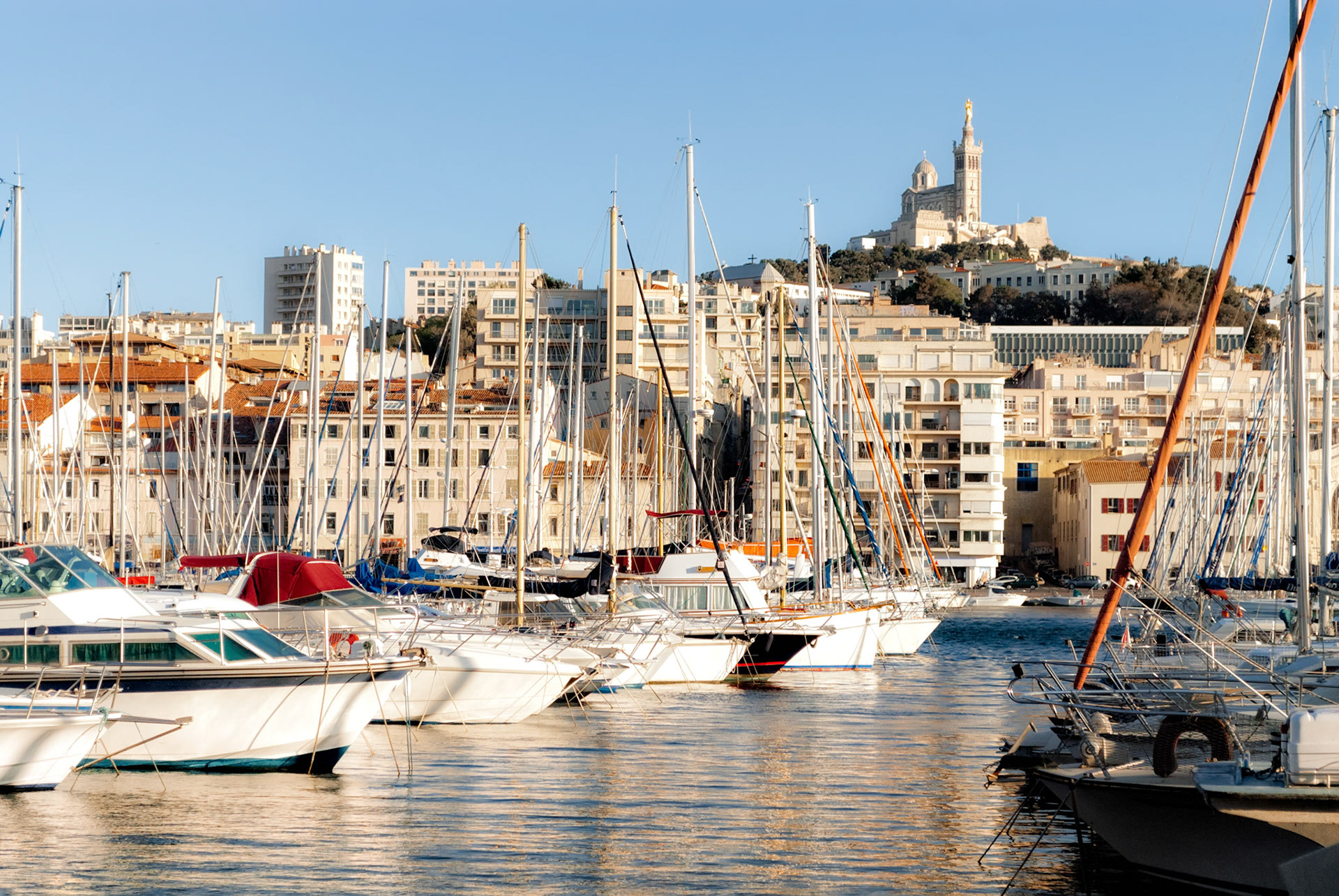 View of Marseille's Vieux Port and Notre Dame de la Garde church, France