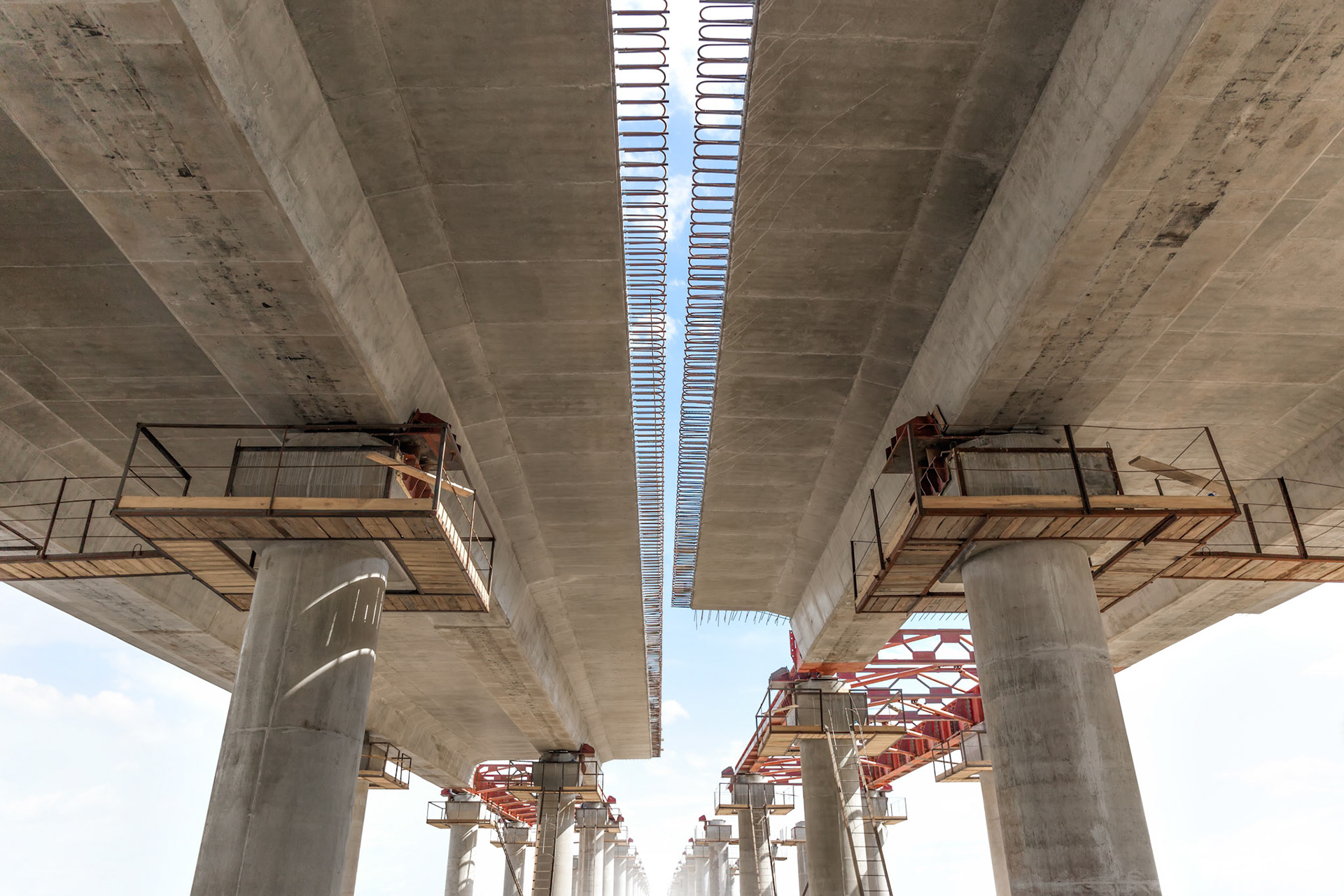 Incremental launch is a recent method of building a complete bridge deck from one end of the bridge only.