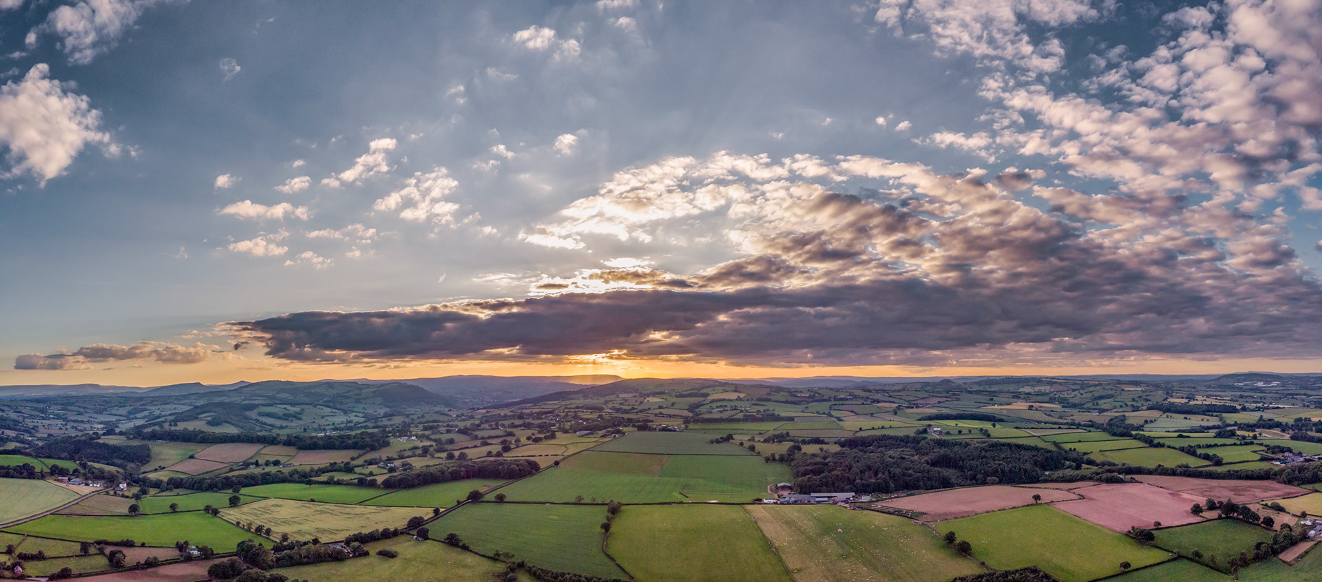 The Sun setting over Wales, from Herefordshire