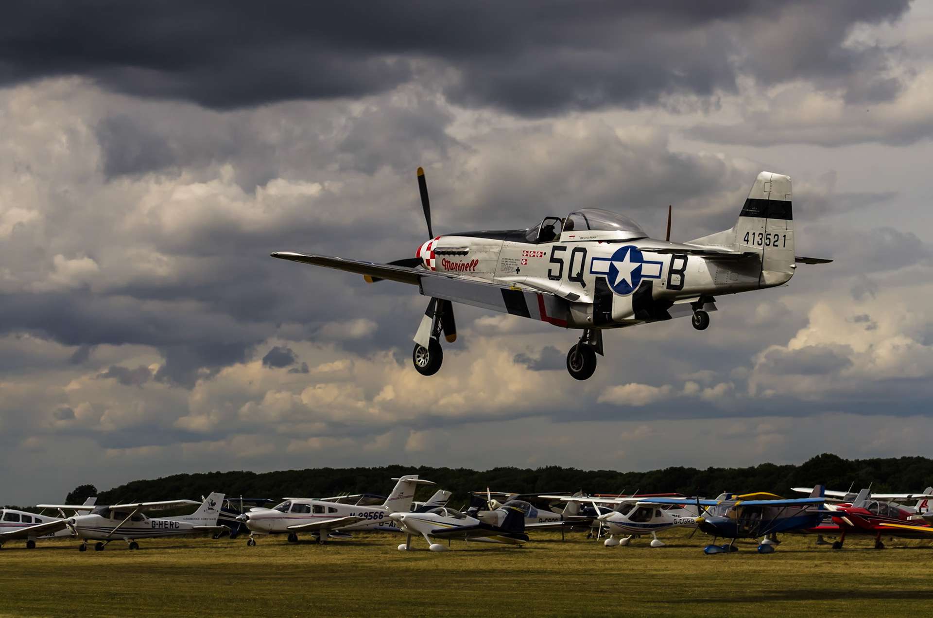 Marinell a P51D Mustang lands at Little Gransden airshow in the UK
