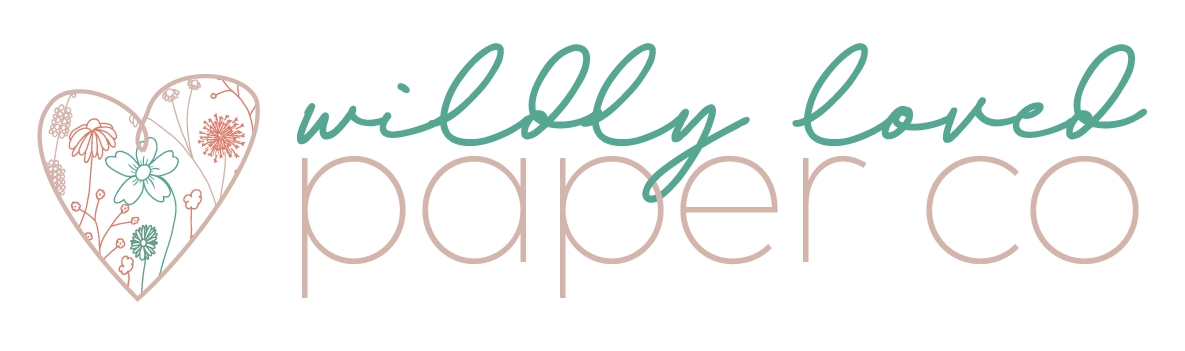 logo for the wildly love paper co, a heart with hand drawn wildlflowers next to the wildly loved paper co 