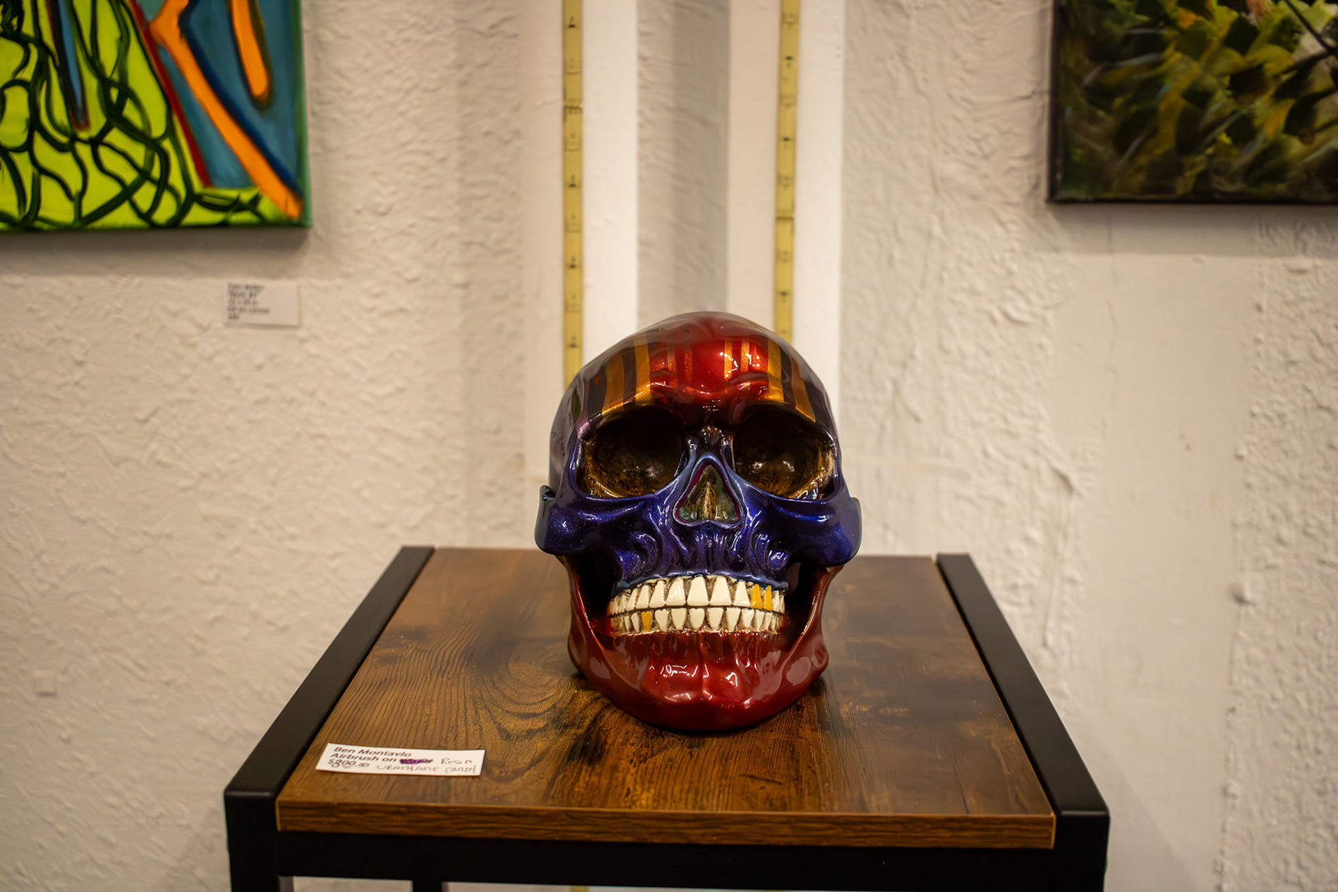Ben Montavlo's airbrushed skull displayed at the RIver east Gallery during the Mural and Art's festival