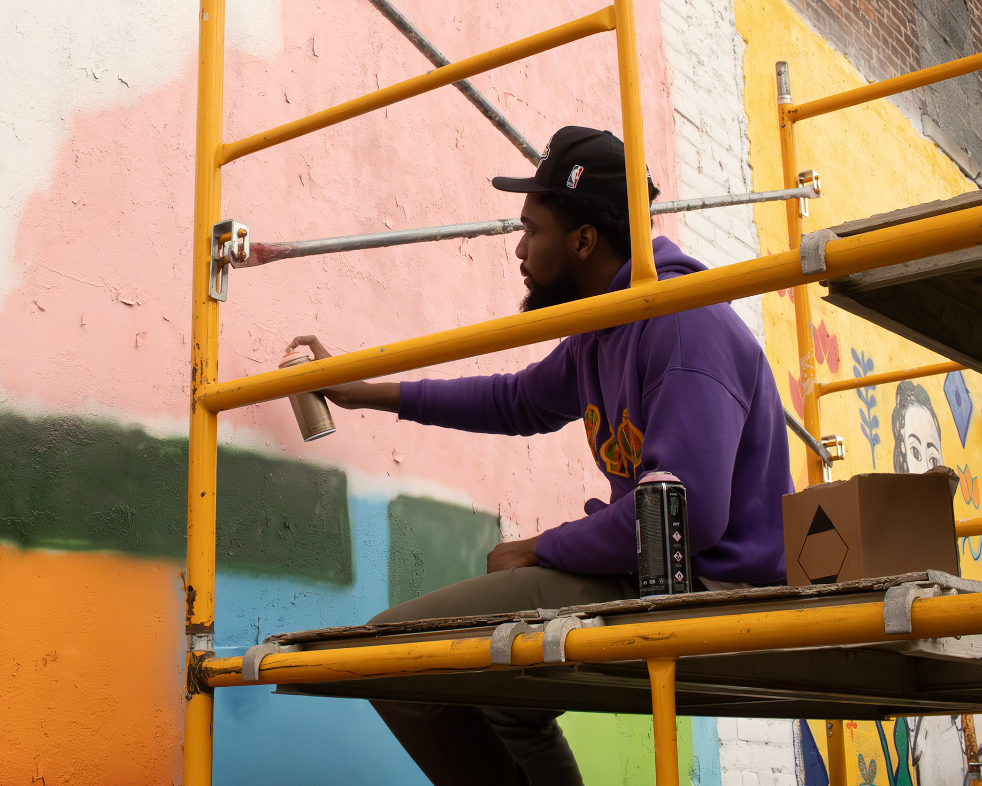 Painter and muralist Brandon "Slew" Slewion bringing his vison to life.