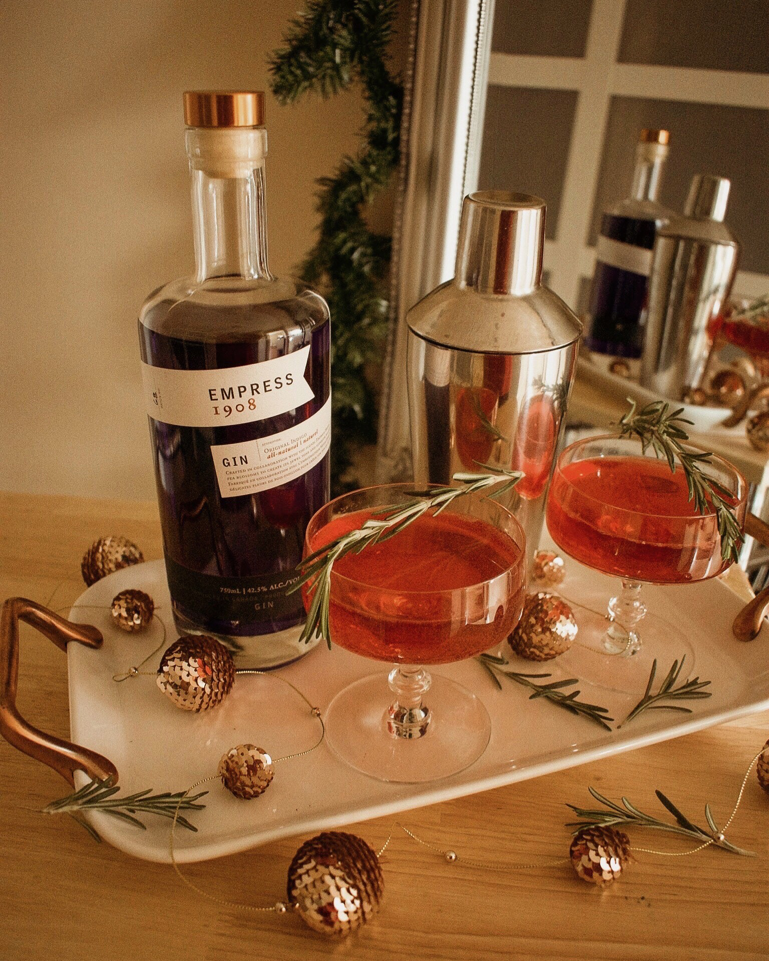 Gin and tonics have become a go-to for my friends and I at get togethers, so naturally the gorgeous purple Empress 1908 Gin will be a staple for entertaining during the holidays! I put a little festive spin on our fave for the holiday season - I mixed 2 oz @empressgin1908, cranberry juice and a squeeze of lime, then finished it off with tonic and a sprig of rosemary. The perfect winter cocktail 🎄 #Empress1908 #Empress1908Holiday #sponsored