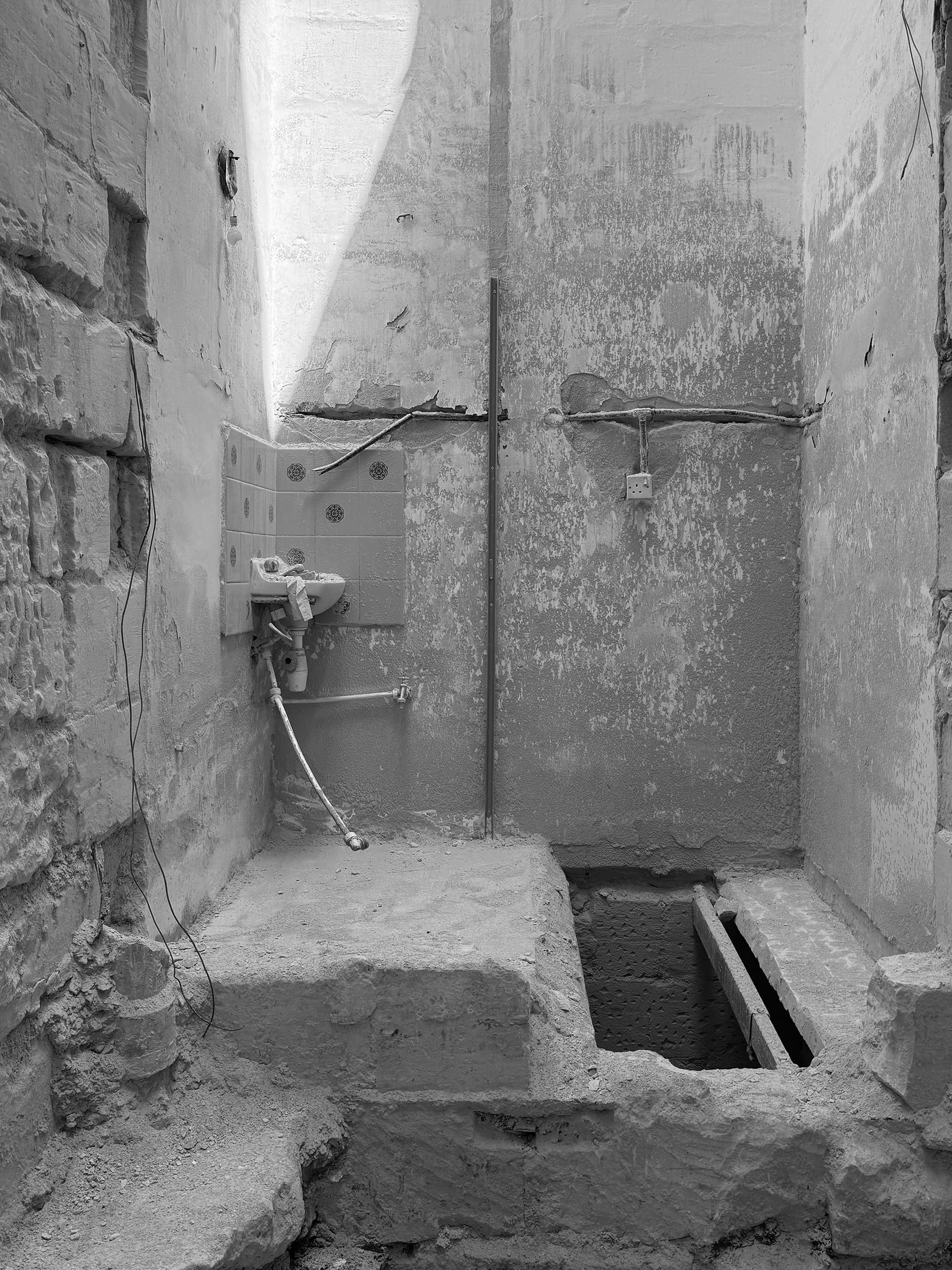 Utilitarian shaft in the center of the townhouse.