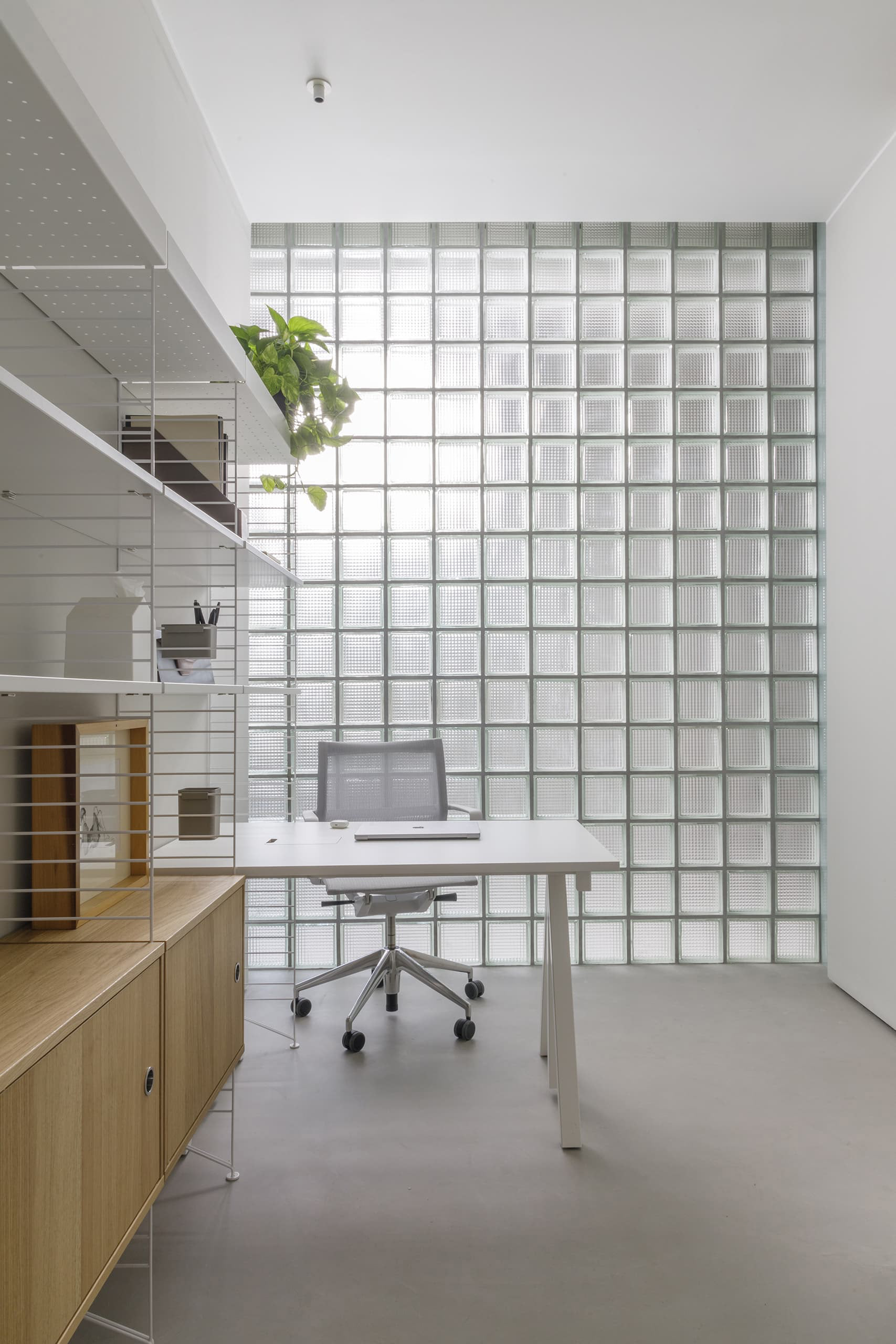Glass blocks fill the offices with disused light.