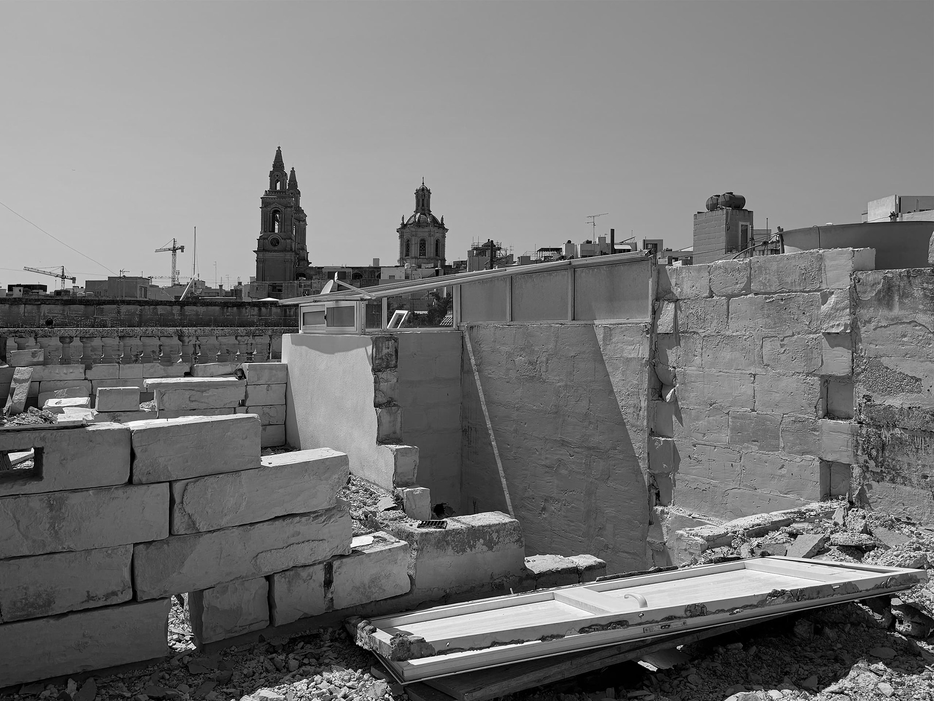 Demolition of existing roof structure.