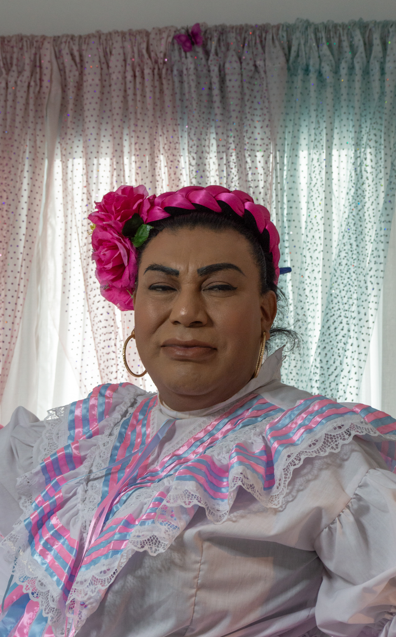 Susana Barrales poses for a portrait in her traditional Mexican folklore dance outfit.