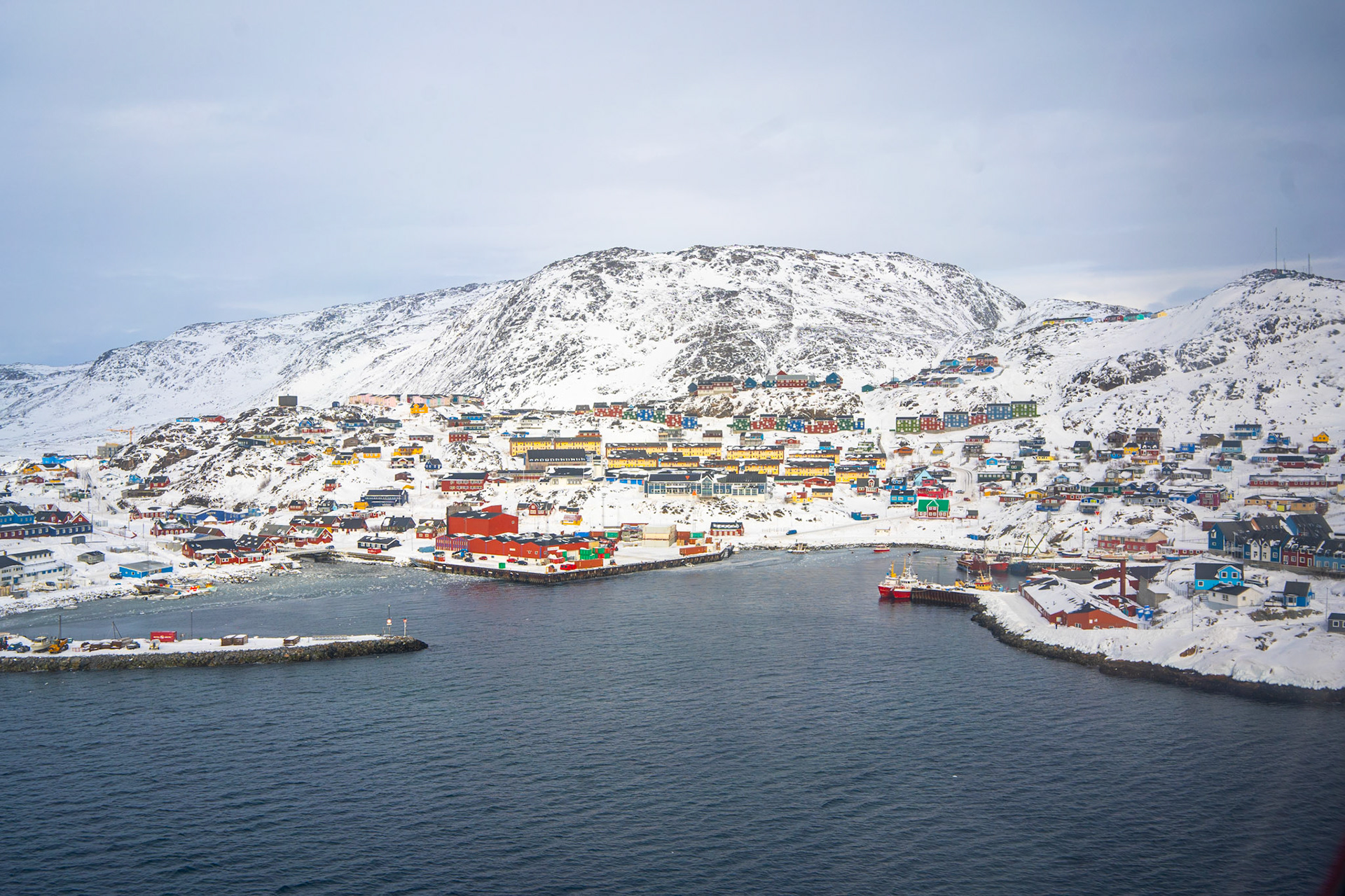 Seeing Qaqortoq for the first time, flying in on the helicopter from Narsarsuaq. Qaqortoq translates from kalaallisut to "white."