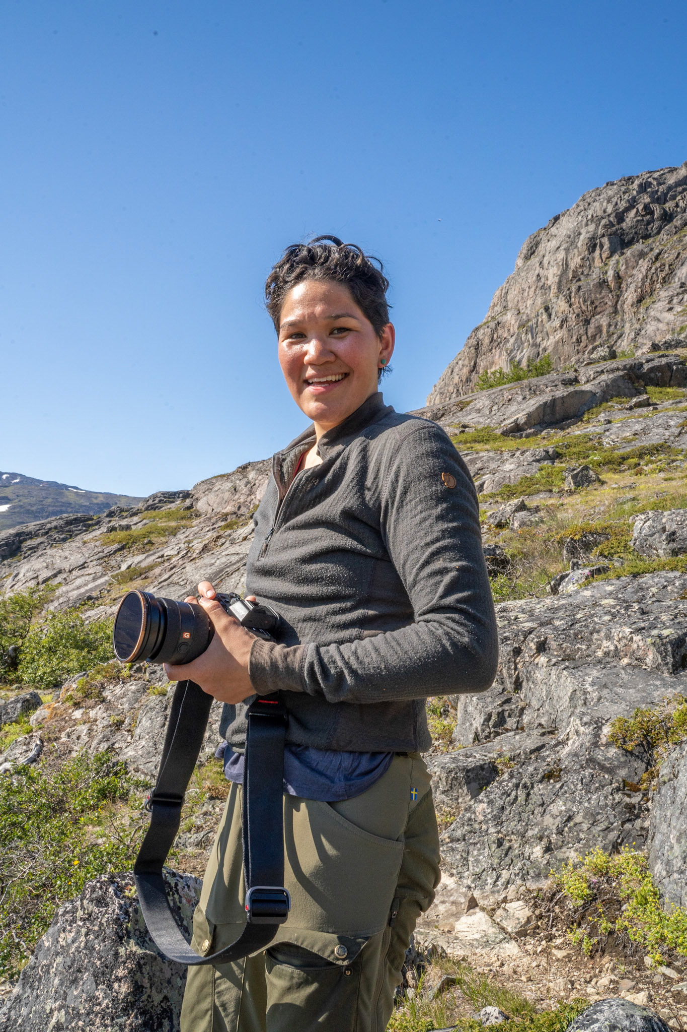 Arina taking pictures and film of the whole adventure.