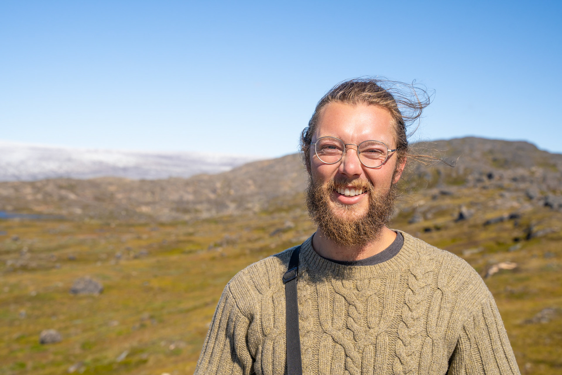 Carson and the ice sheet, big smiles.